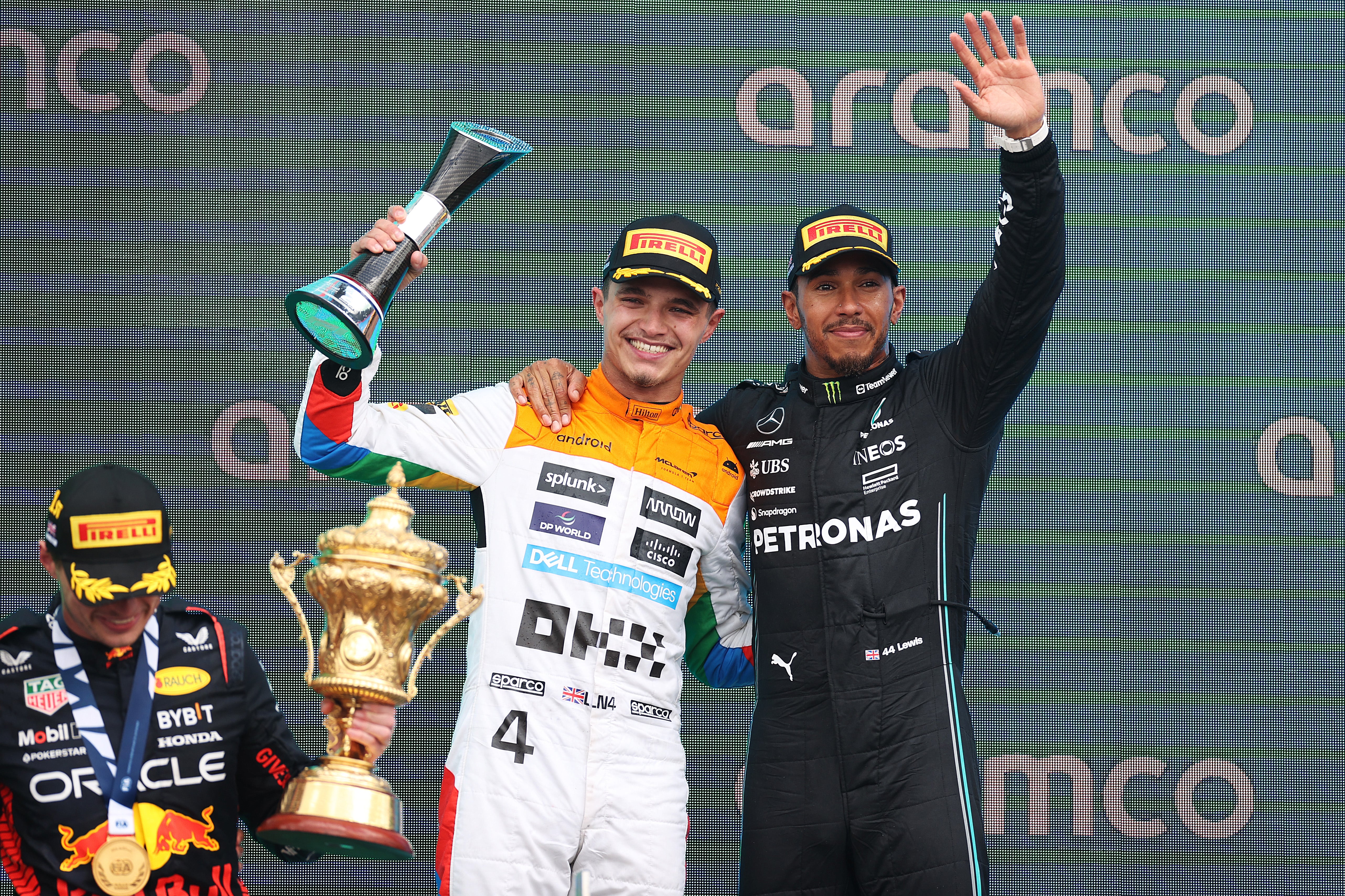 Norris celebrates his podium finish with fellow Brit Lewis Hamilton after a brilliant battle on the track