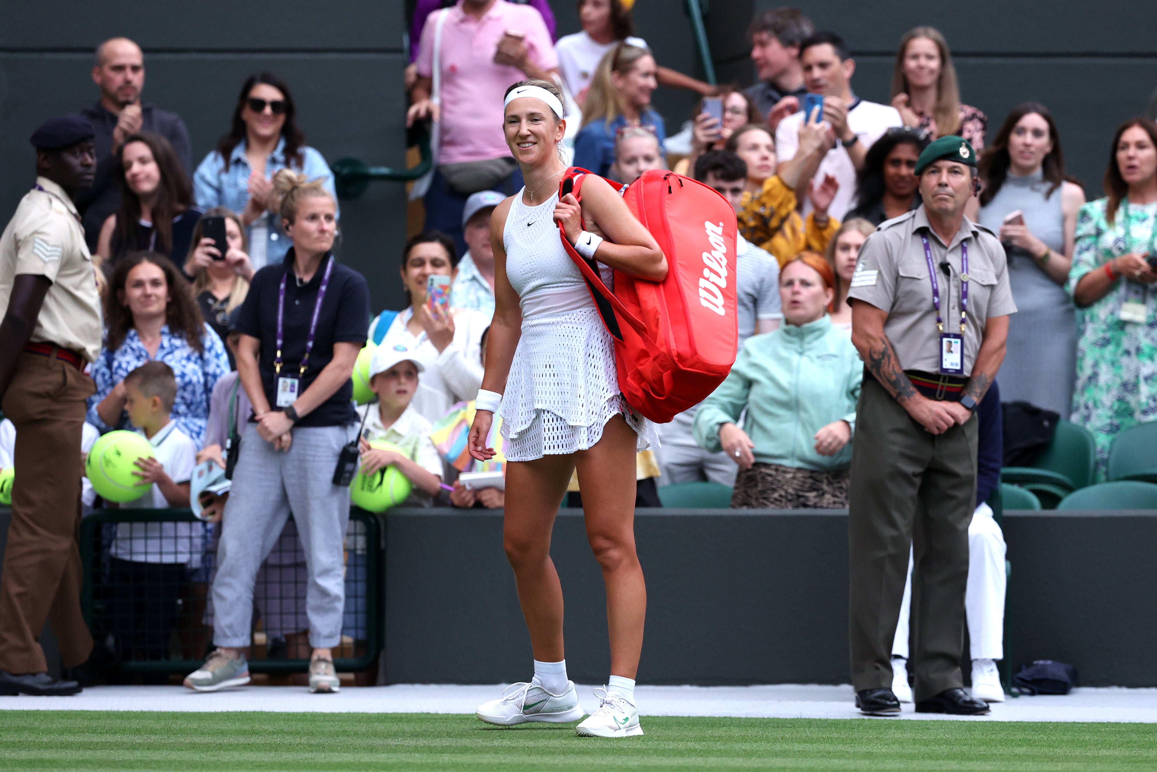 Victoria Azarenka reacts after she is booed off the court at Wimbledon