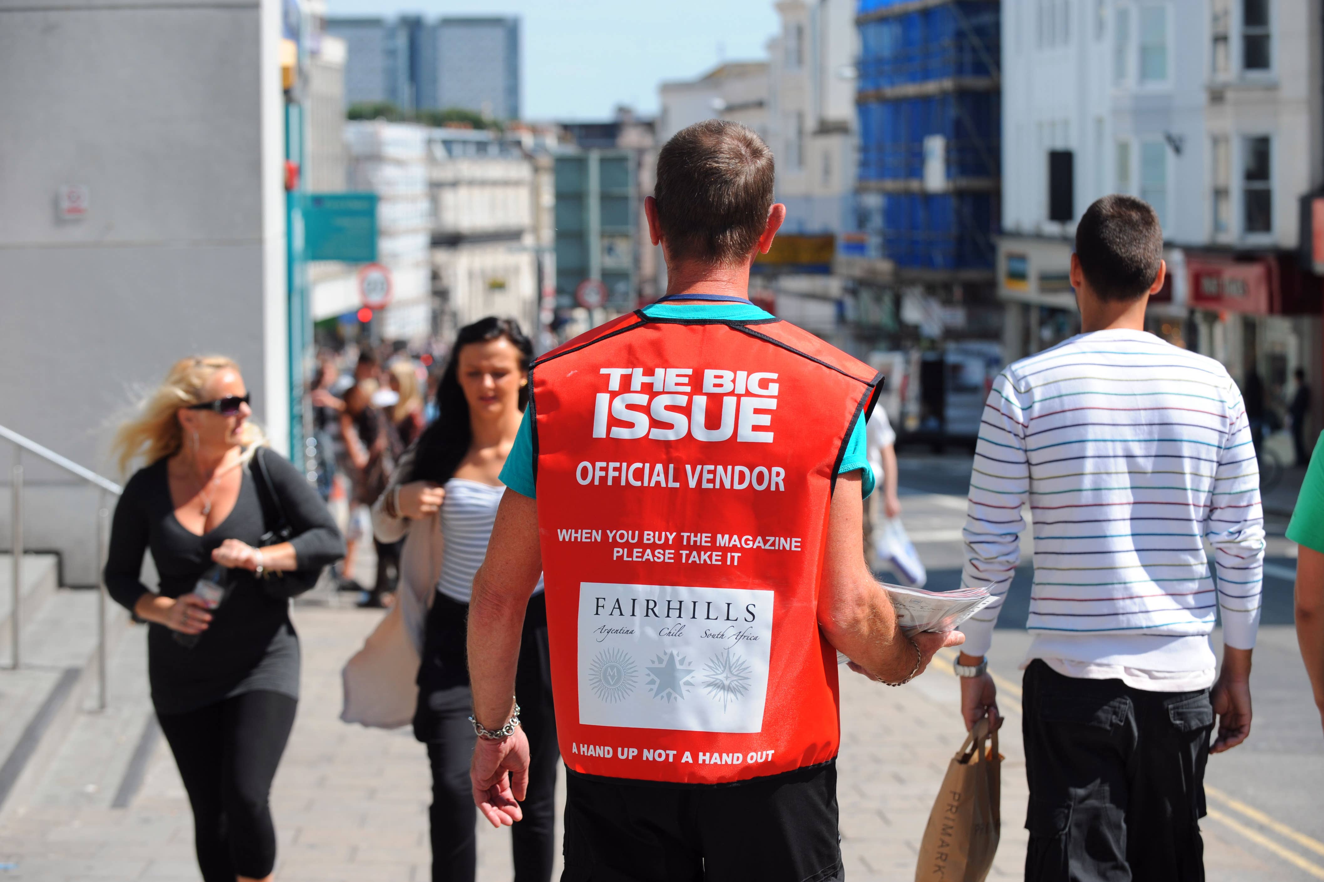 A Big Issue vendor in Brighton city centre. The organisation is launching a new initiative to increase sales (Alamy/PA)