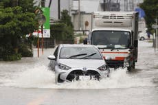 Heavy rains cause flooding and mudslides in southwest Japan, where at least 6 people are missing