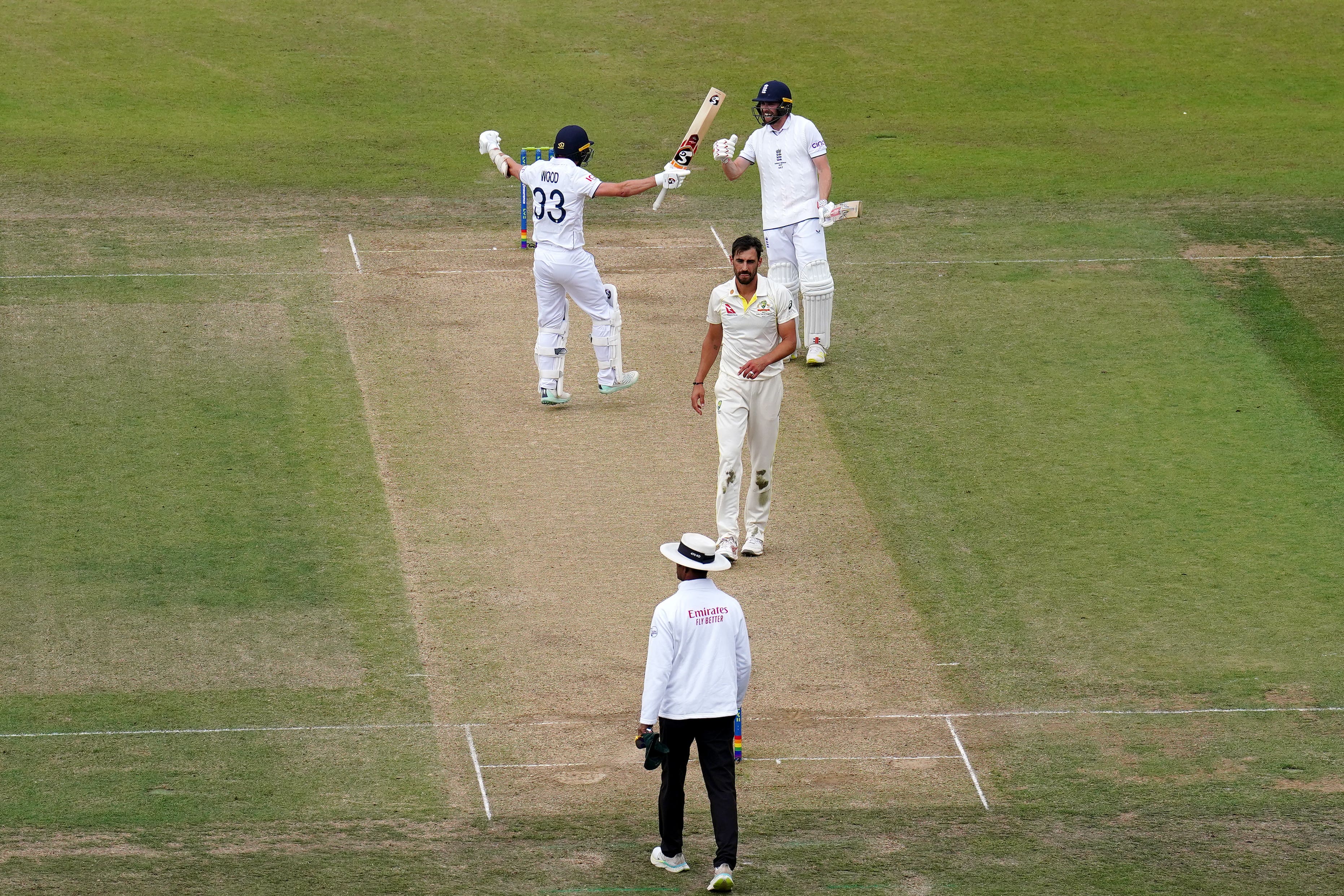 Chris Woakes and Mark Wood celebrate after England’s victory in the third Ashes Test at Headingley (Mike Egerton/PA)