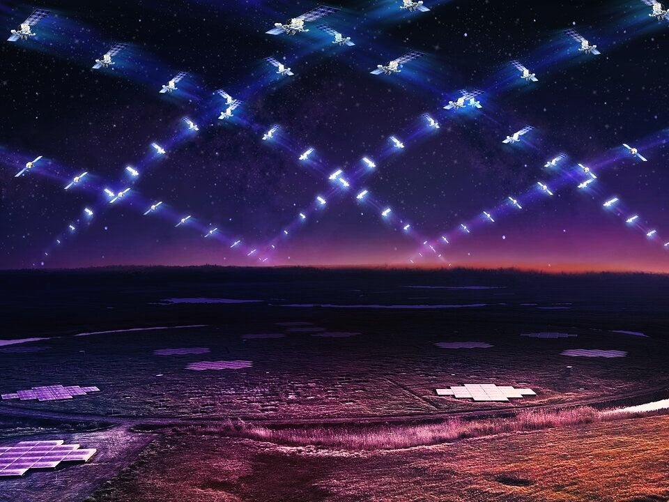 An artist’s impression of a large satellite constellation like Starlink in low Earth orbit circling above the LOFAR telescope