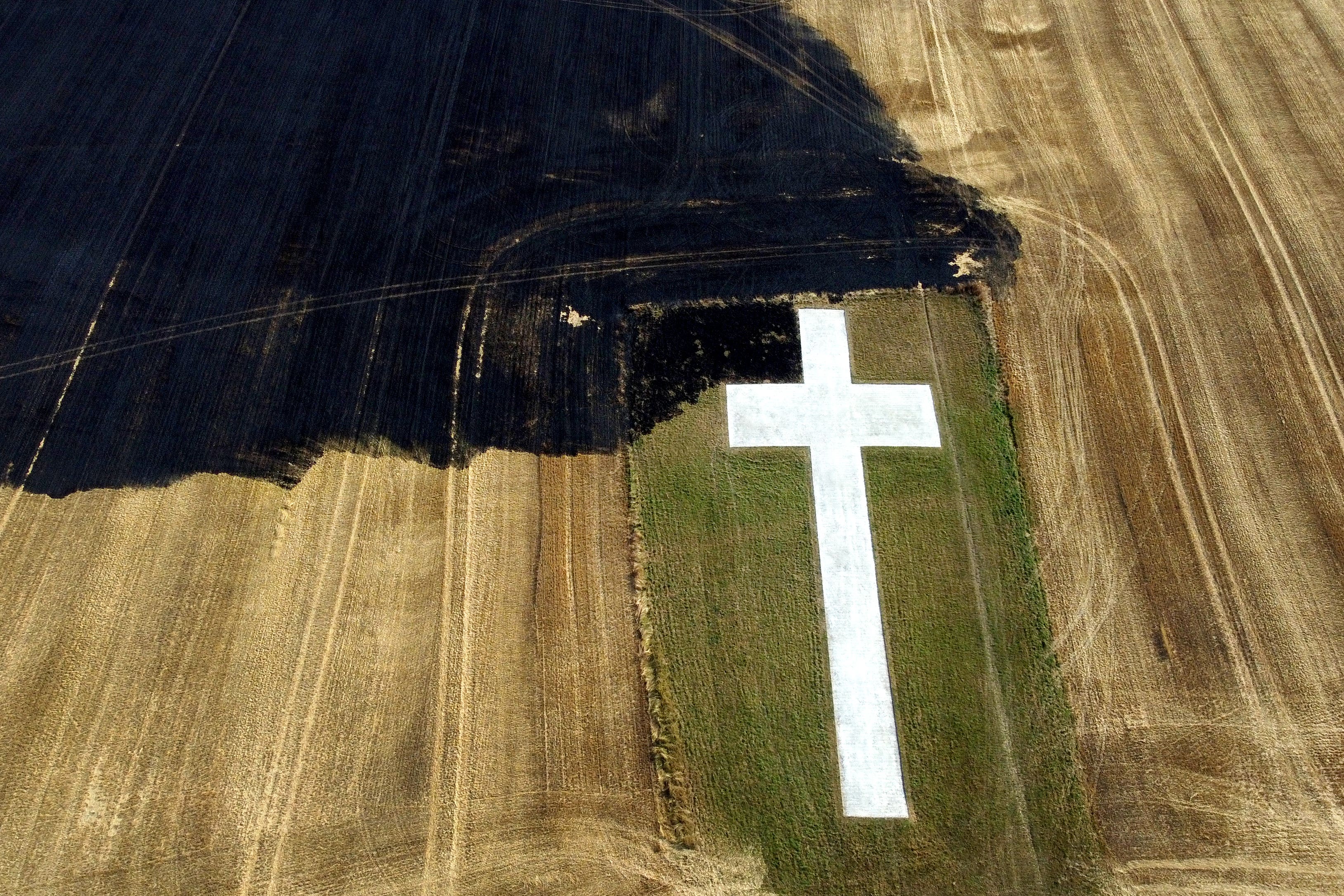 The Lenham Cross war memorial in Kent was almost burned by a grassfire during the intense heatwave of late July last year. Researchers say the number of heat-related deaths across Europe is concerning (Gareth Fuller/PA)