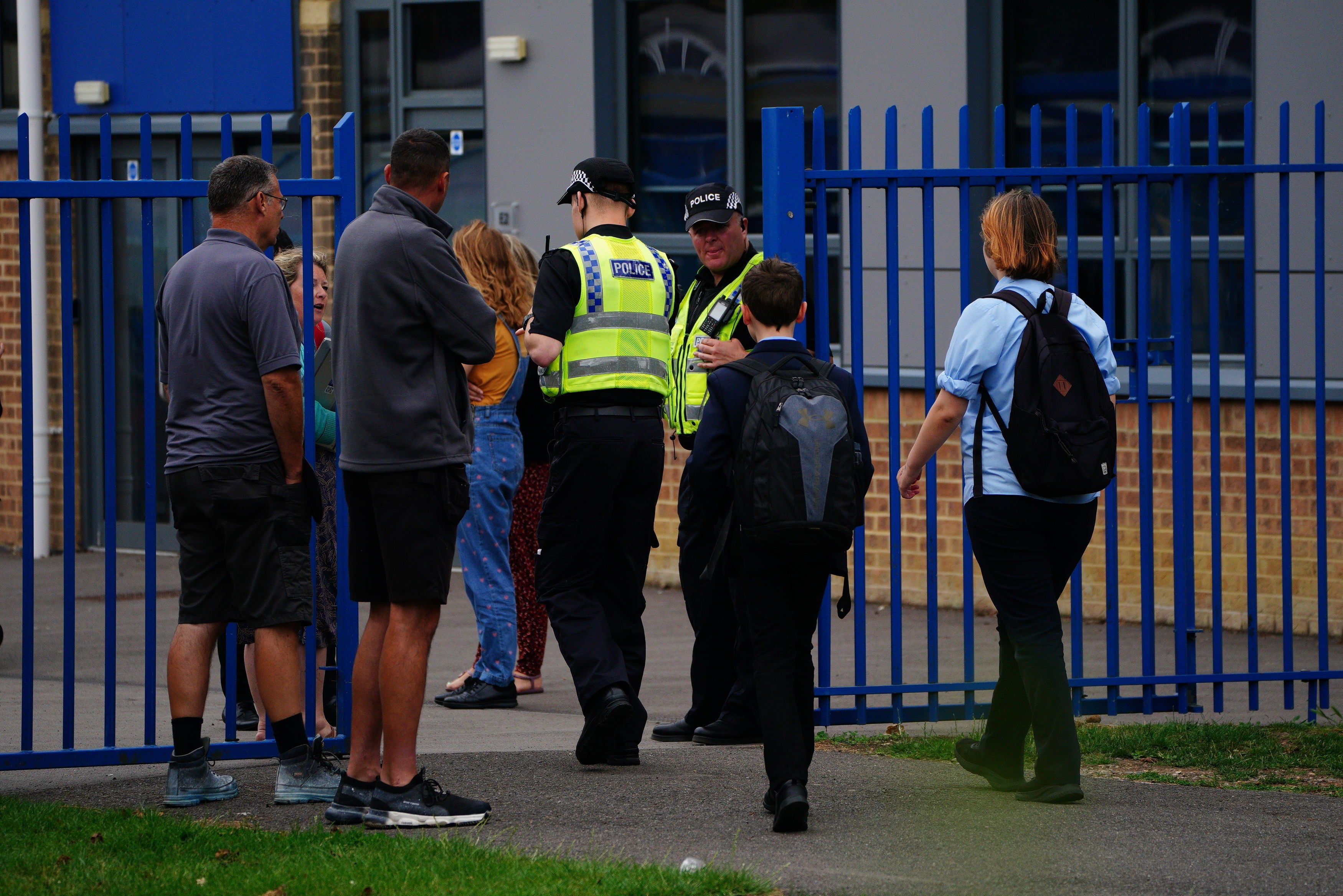 The teacher was attacked in the corridor of the secondary school just after 9am, police said