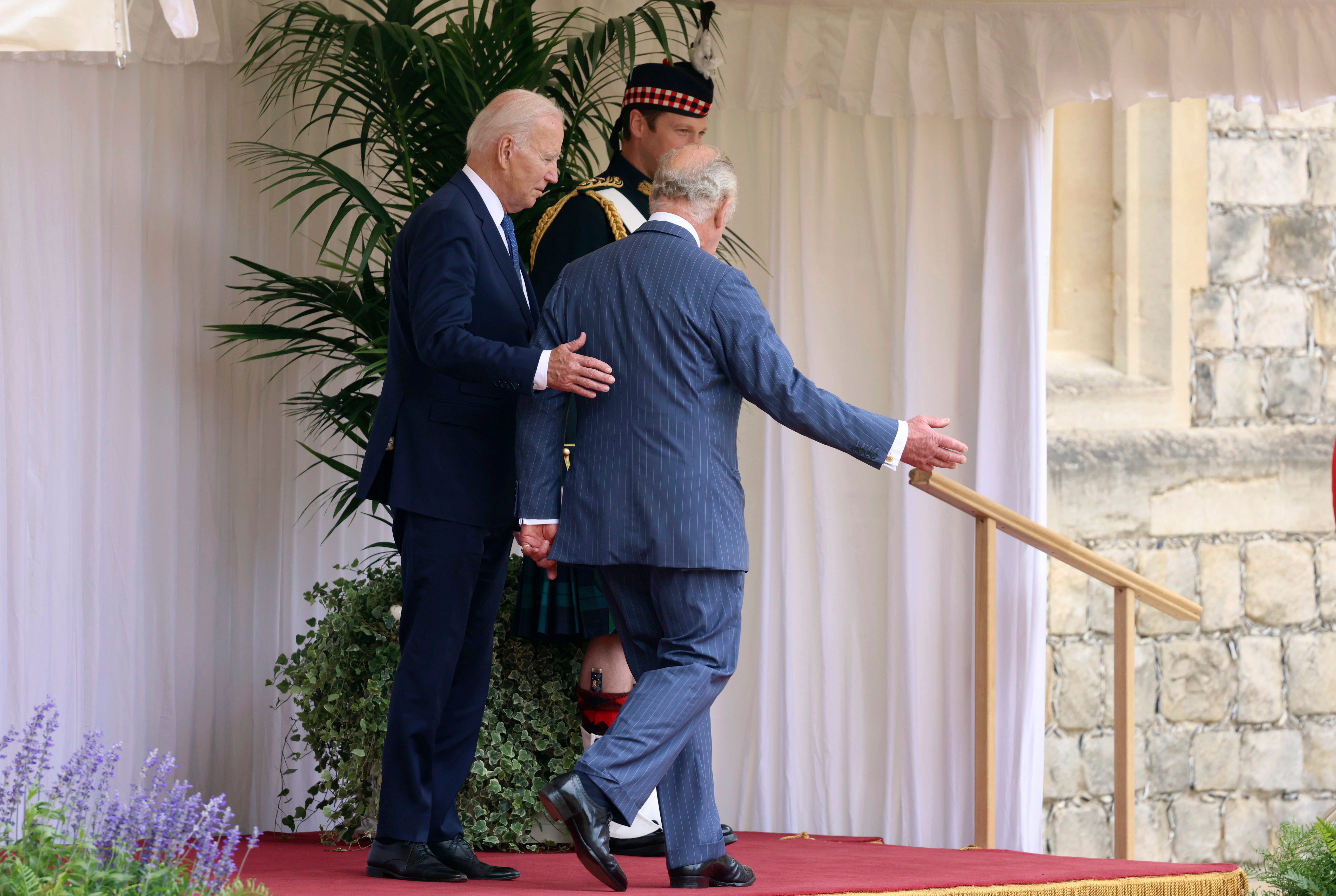 The president appeared to breach protocol by putting his hand on the King’s back, although the palace was quoted as saying the monarch was ‘entirely comfortable’ with the gesture