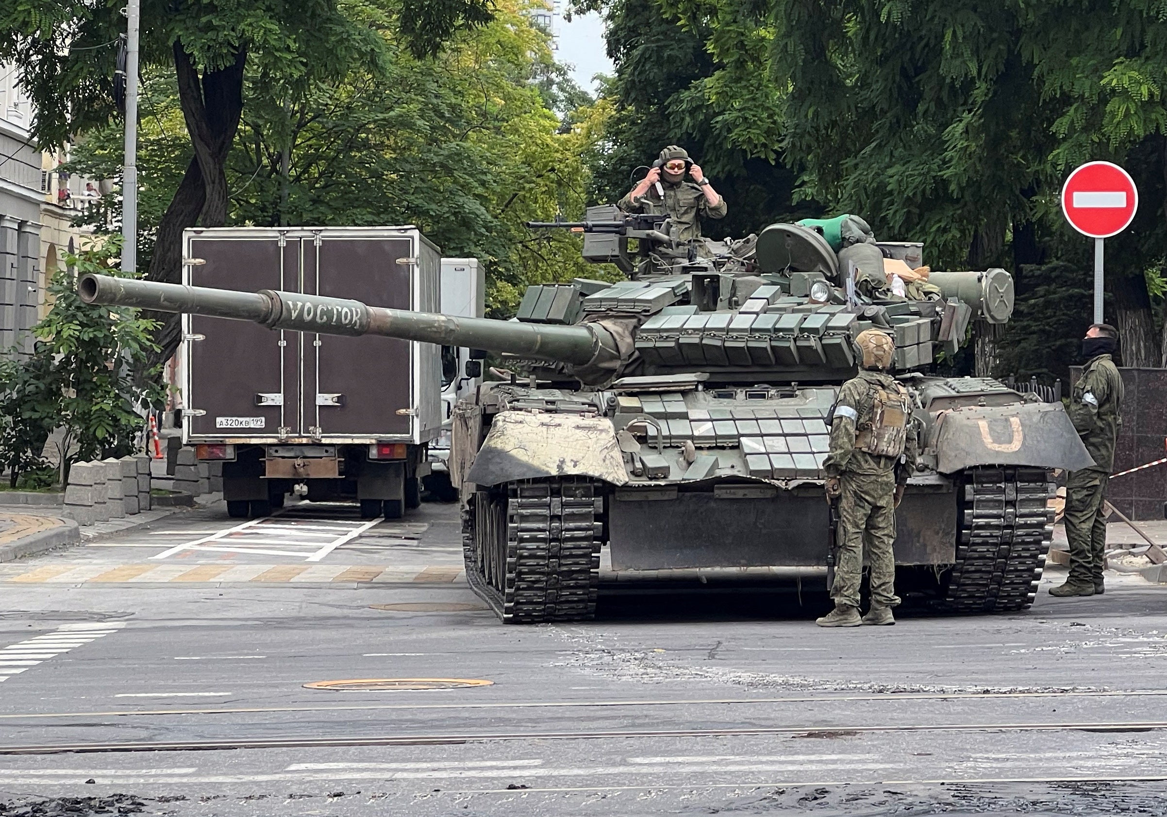 Fighters of Wagner private mercenary group are seen in a street near the headquarters of the Southern Military District in the city of Rostov-on-Don, Russia, June 24, 2023.