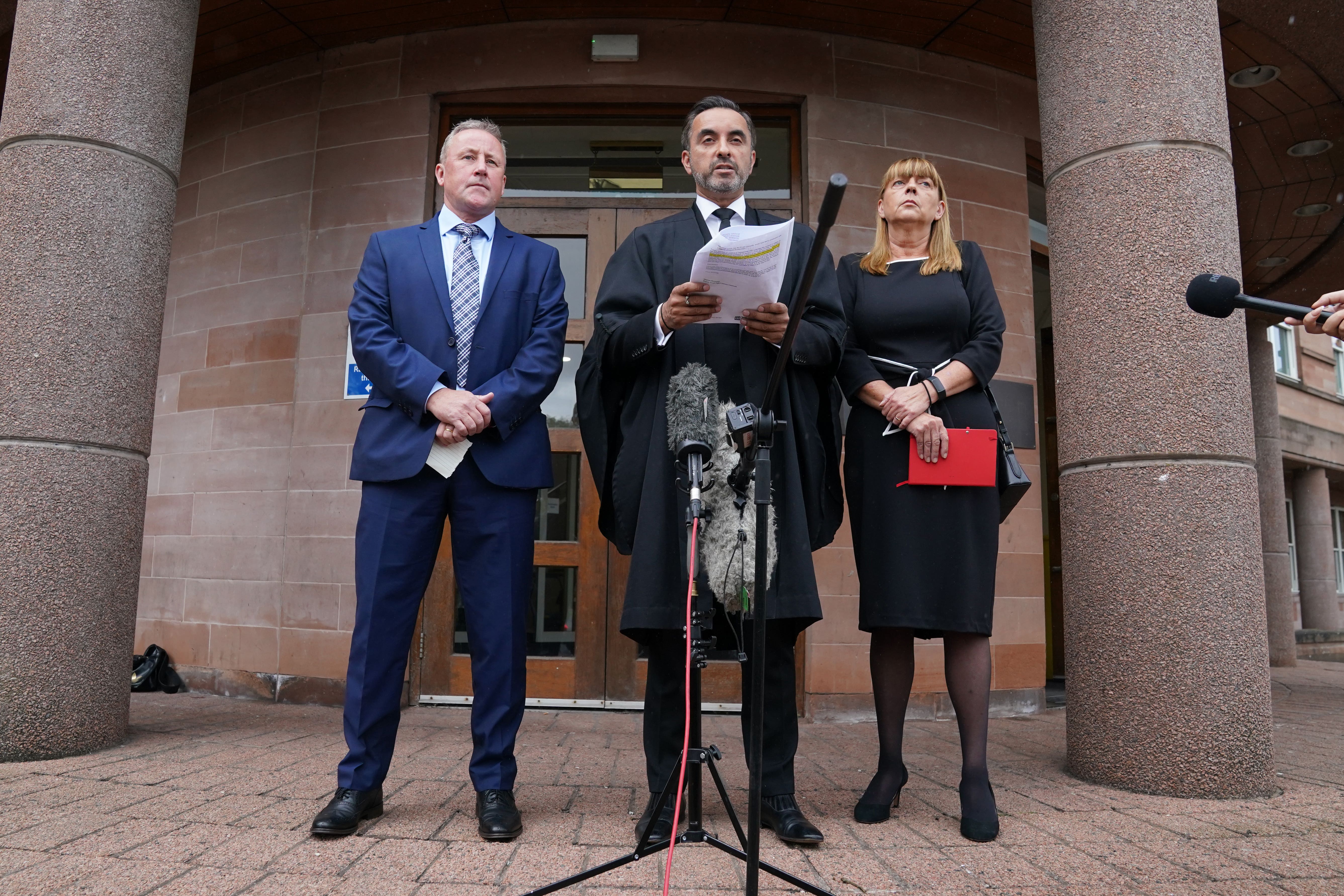 Linda and Stuart Allan, parents of Katie Allan, alongside solicitor Aamer Anwar (Andrew Milligan/PA)