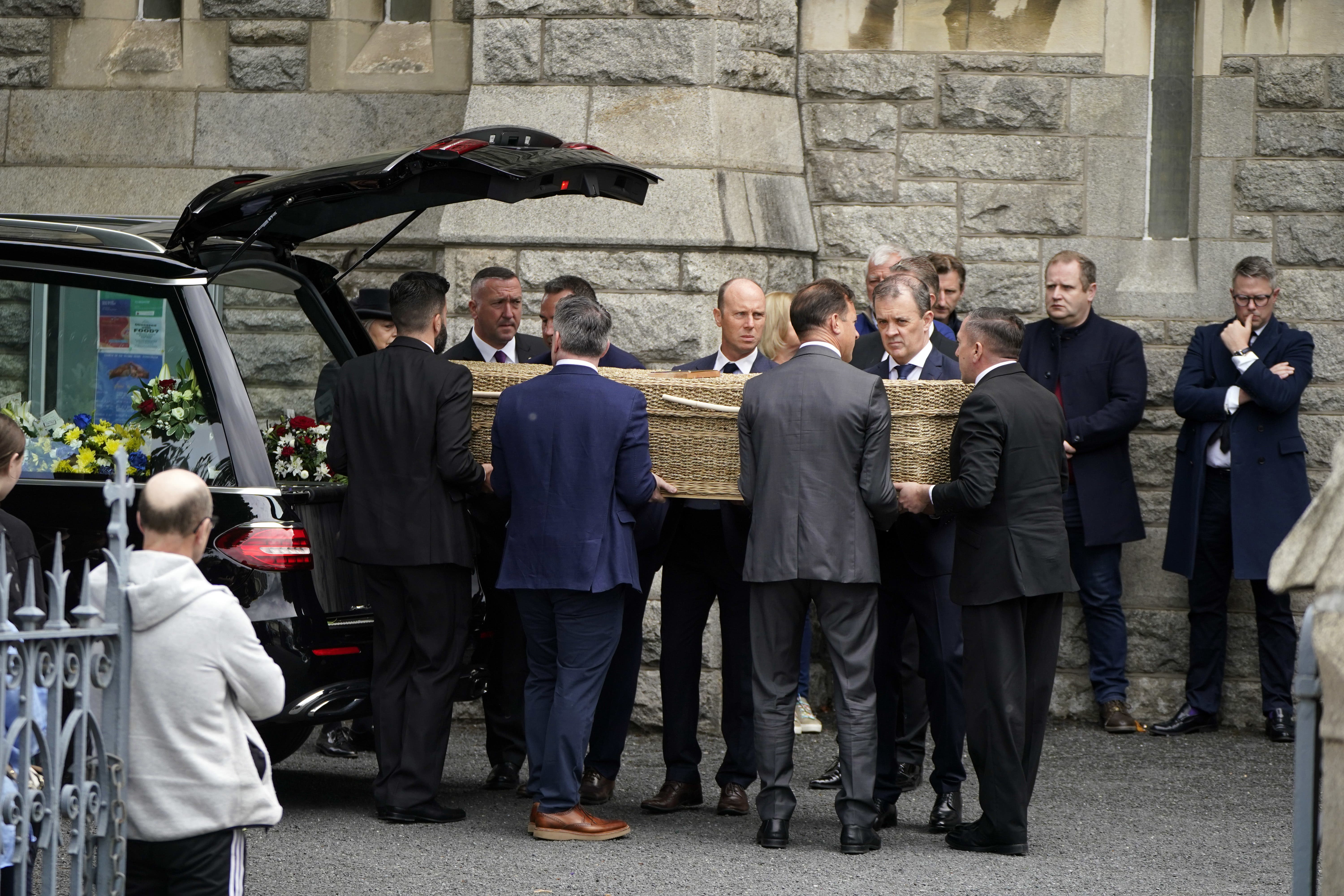 The coffin of Andrew O’Donnell is carried into the Church of the Sacred Heart, Donnybrook, Dublin, ahead of his funeral (PA/Niall Carson)