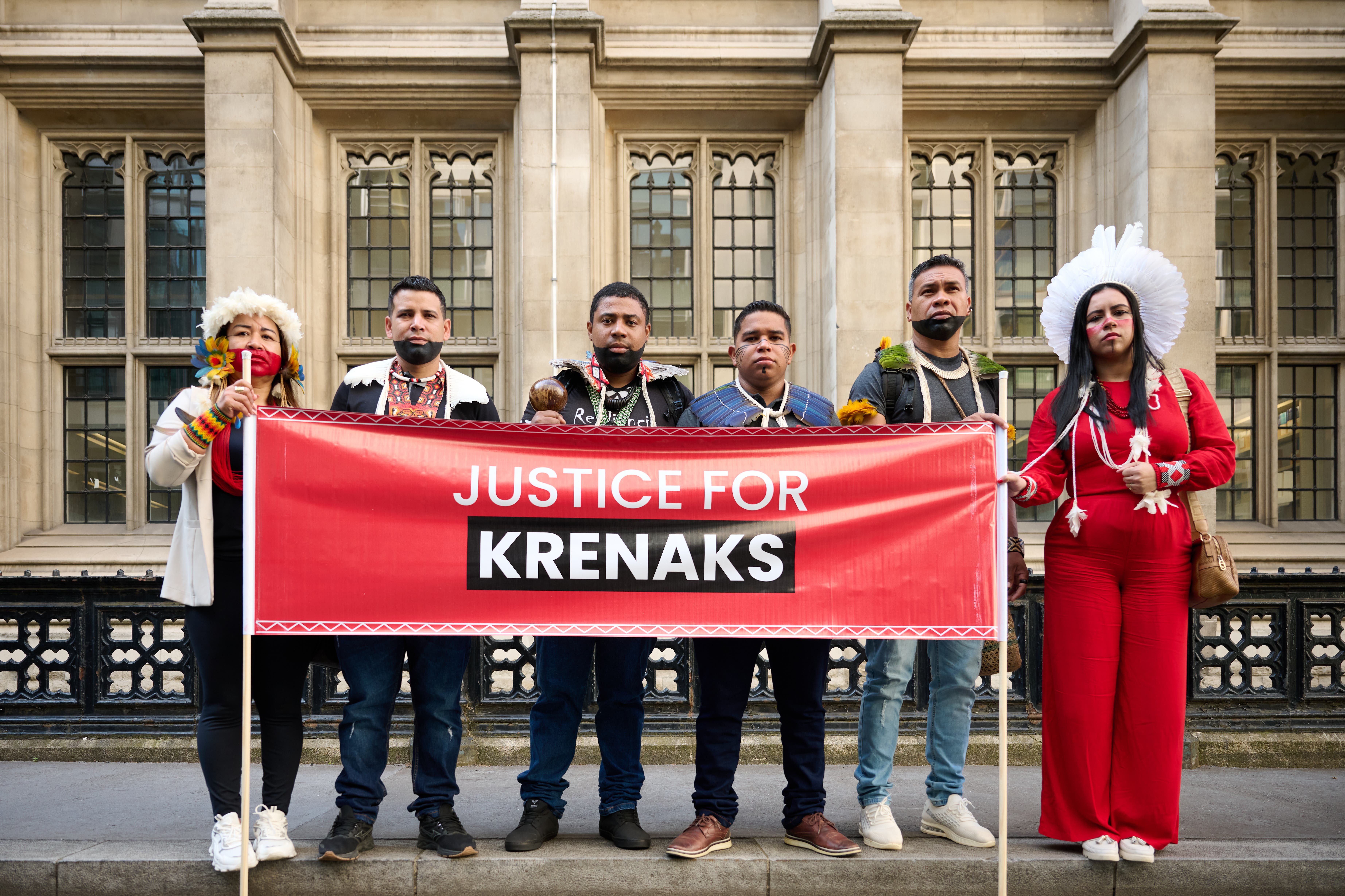 Indigenous communities protest outside the Technology and Construction Court (Matt Pover)12th July 2023.Members of several Brazilian indigenous communities todays gathered outside the Royal Courts of Justice in London to label mining giants BHP and Vale ‘Climate Criminals’. The joined the Movement of people Affected by Dams (MAB) to demonstrate against the firms who they claim have destroyed their land with their mining activities and are to blame for Brazil’s worst ever environmental disaster – the collapse of the Mariana dam. BHP face Vale in court this week attempting to bring their co-owners into civil action over the disaster. One free editorial reproduction only within context of this story.