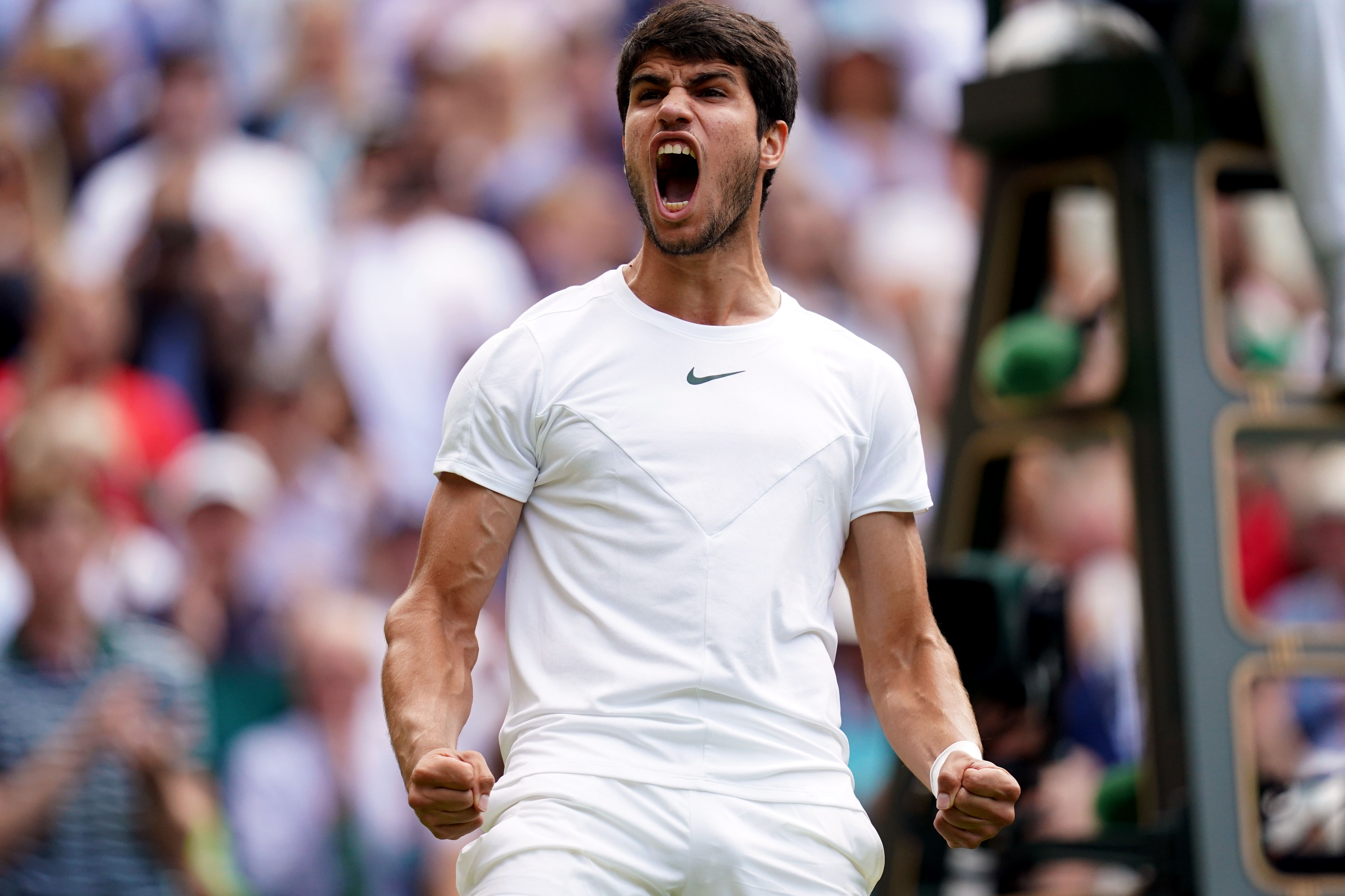 Carlos Alcaraz powered into the Wimbledon semi-finals (John Walton/PA)