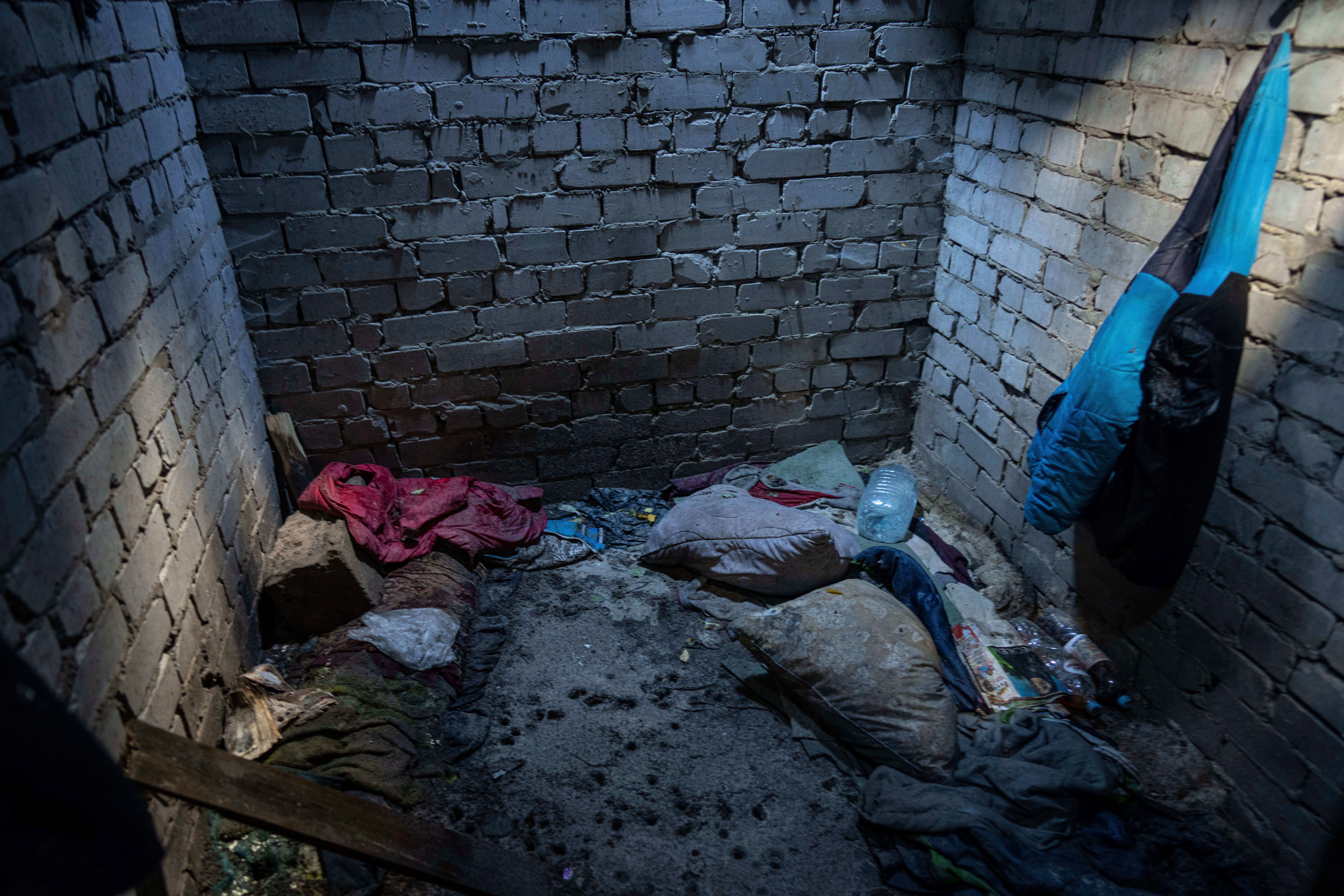 Debris lies on the floor of a building used by Russian forces where civilians said they were held and tortured, in Izium