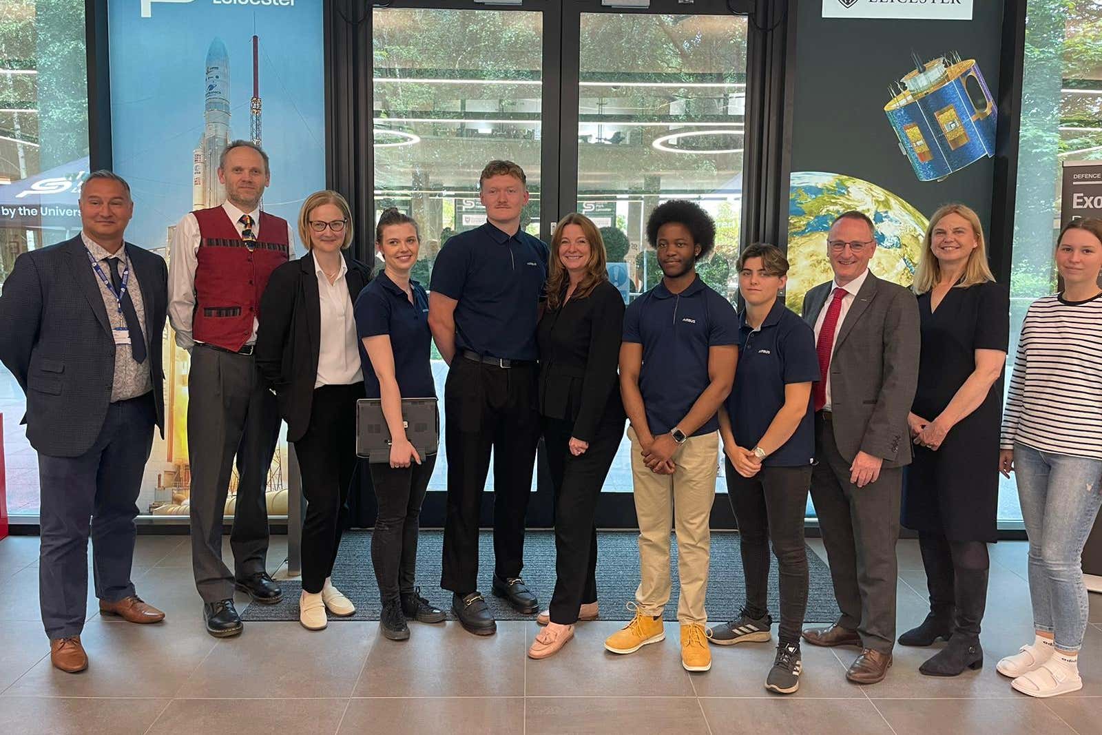 Education Secretary Gillian Keegan (centre) with degree apprentices and staff from Airbus and the University of Leicester as she launched the new space engineering degree apprenticeship at the city’s Space Park (Callum Parke/PA)