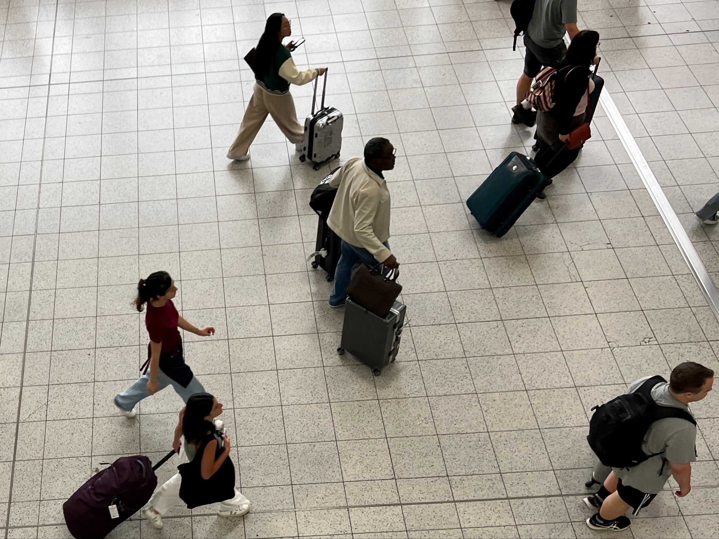 Going places: Passengers at London Gatwick airport, where strikes by ground handlers have been called off