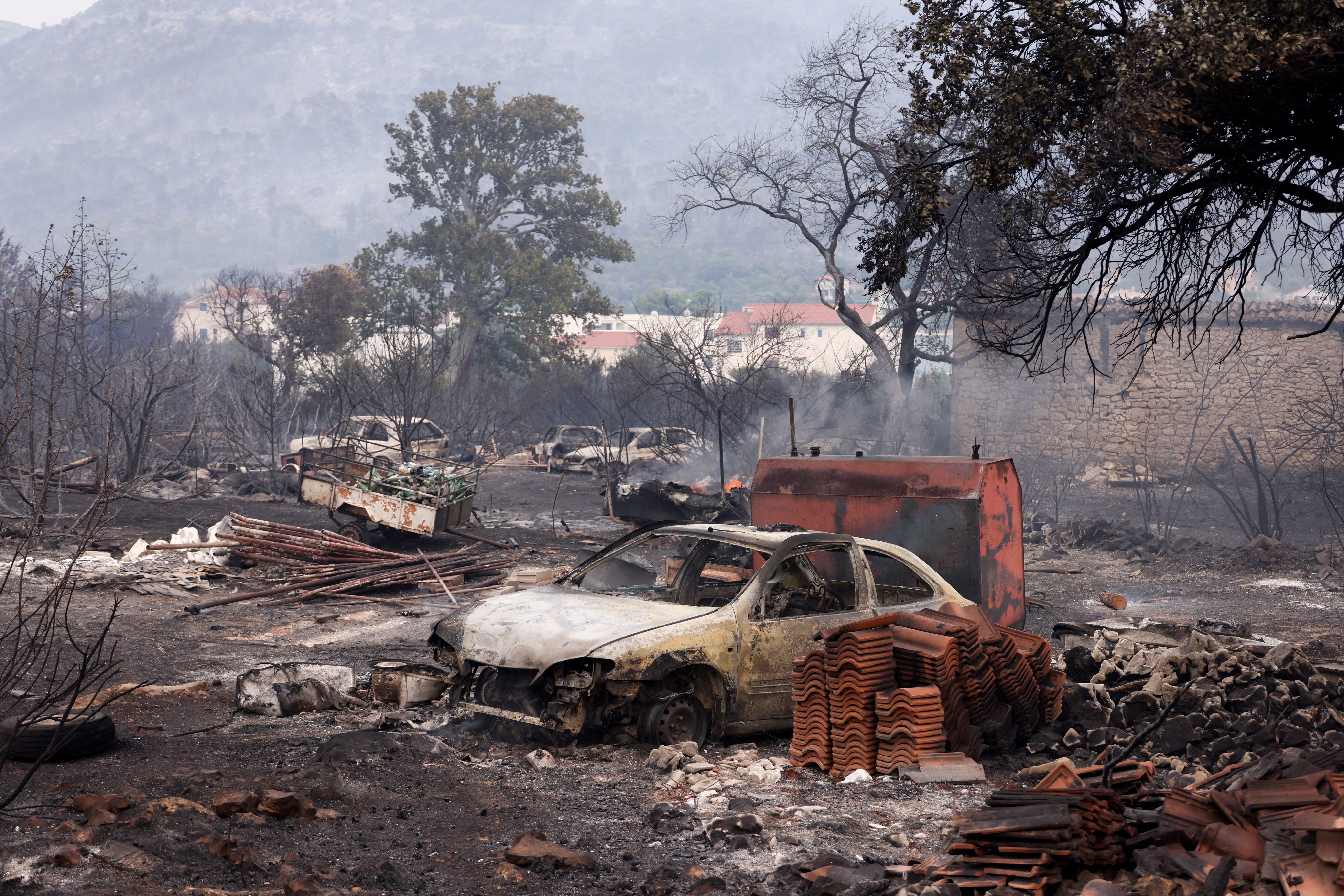 A view of damage done by wildfire, in Grebastica, Croatia