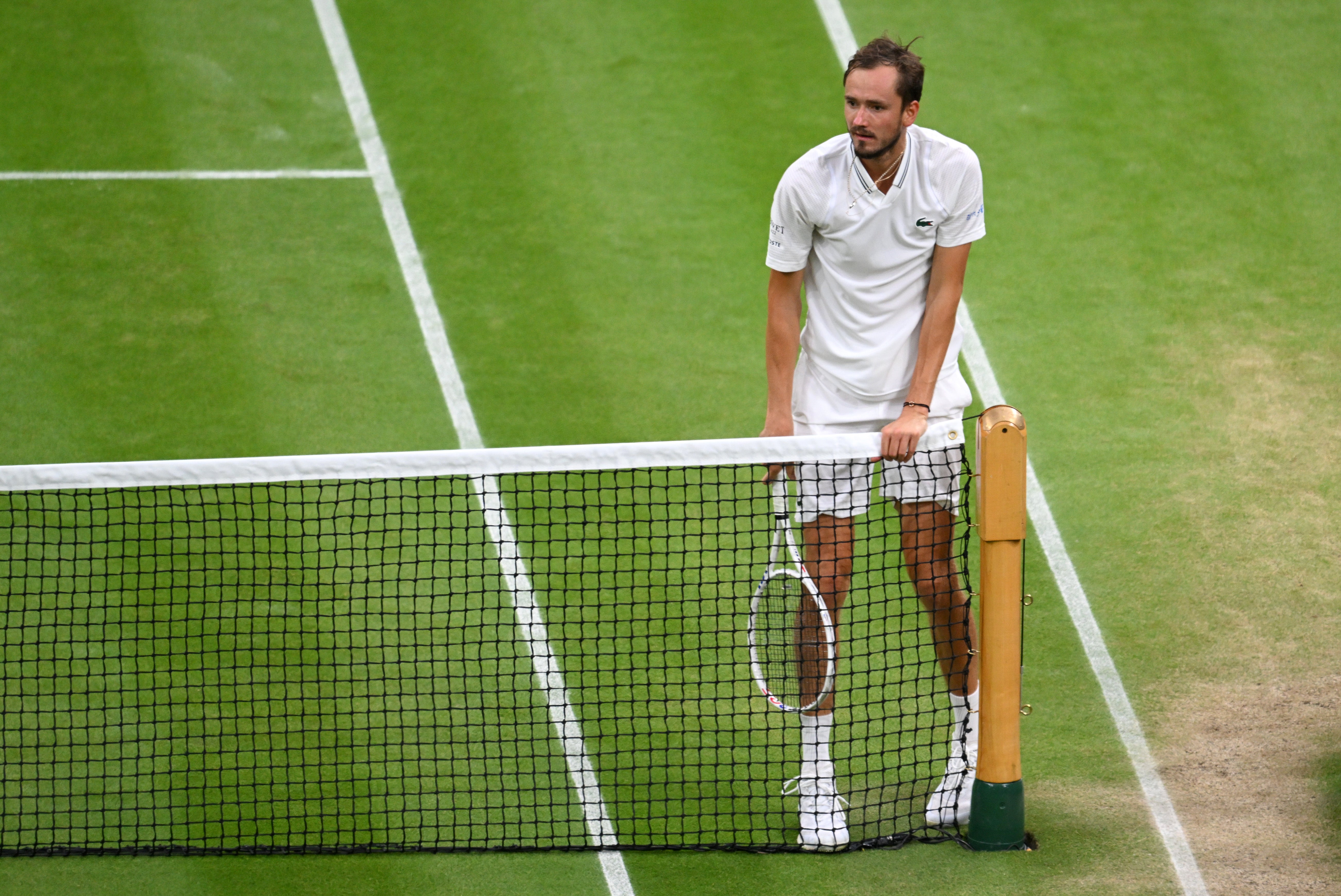 A deflated Medvedev during his straight-sets loss to Alcaraz