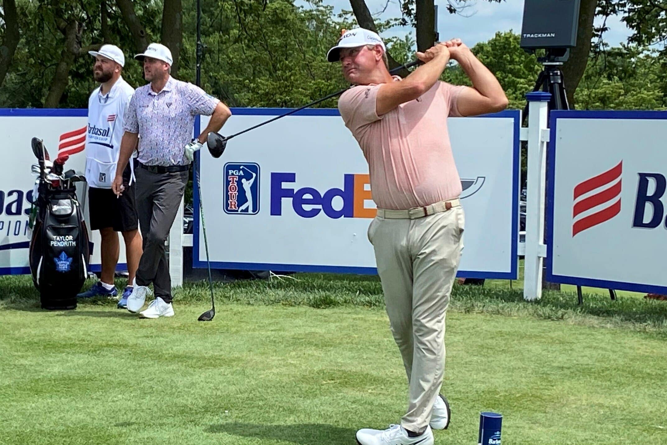 Lucas Glover tees off on the first hole at the Barbasol Championship golf tournament. (Cameron Drummond/Lexington Herald-Leader via AP)