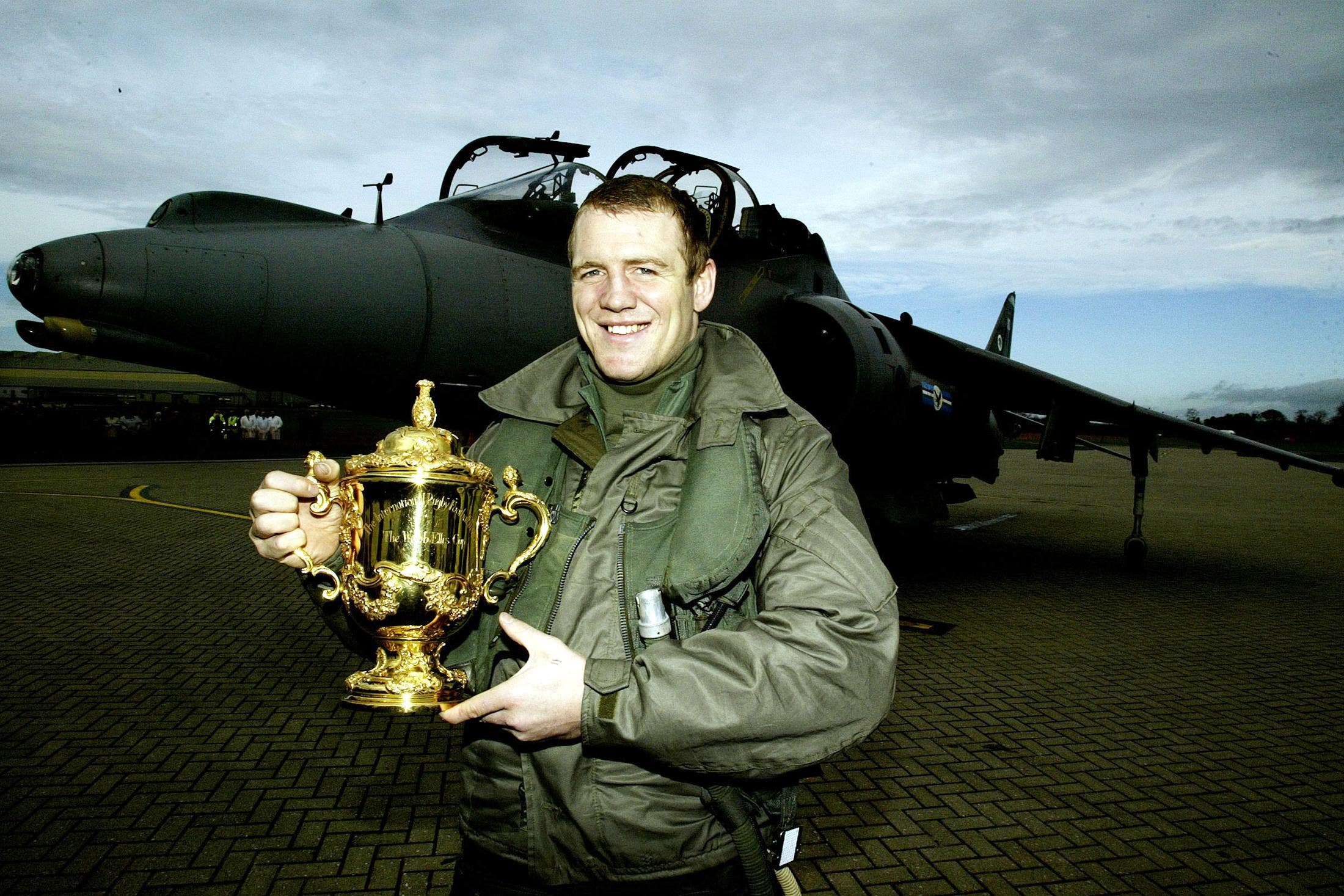 Mike Tindall carries the Webb Ellis Trophy (Nick Potts/PA)