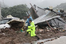 Over 20 dead and 10 missing as landslides, flood sweep homes in South Korea
