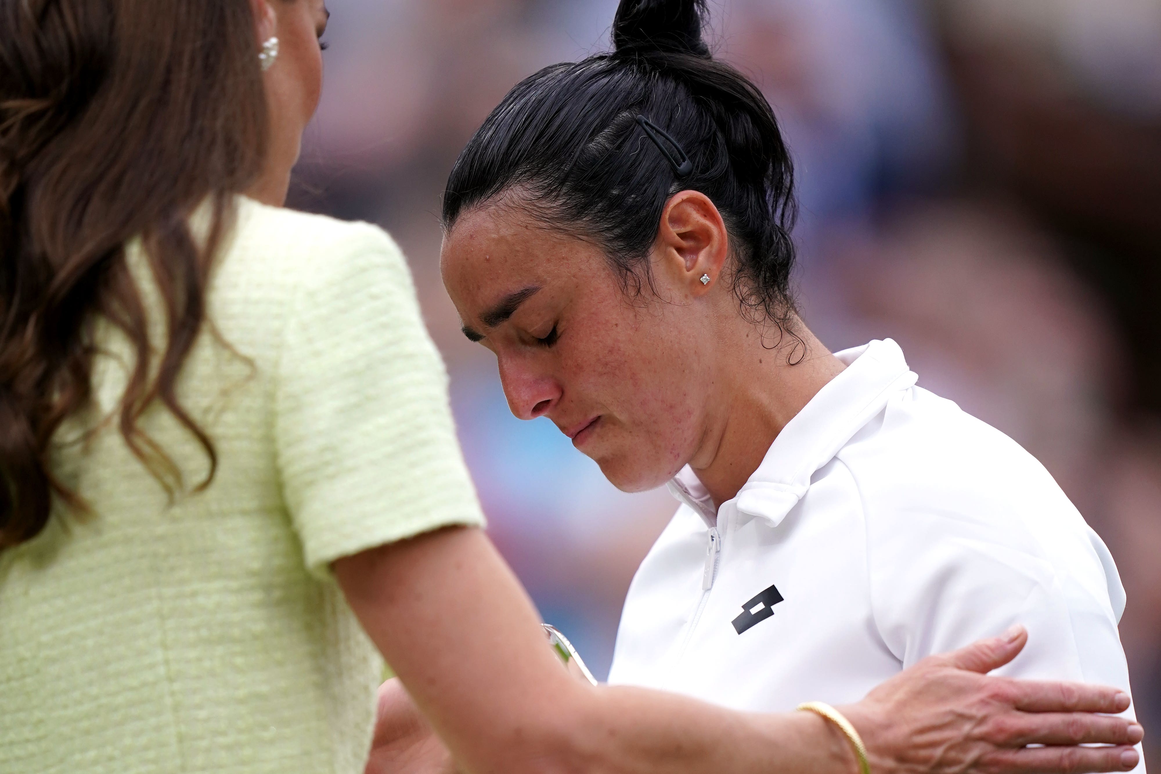 The Princess of Wales consoled Ons Jabeur after her defeat (John Walton/PA)