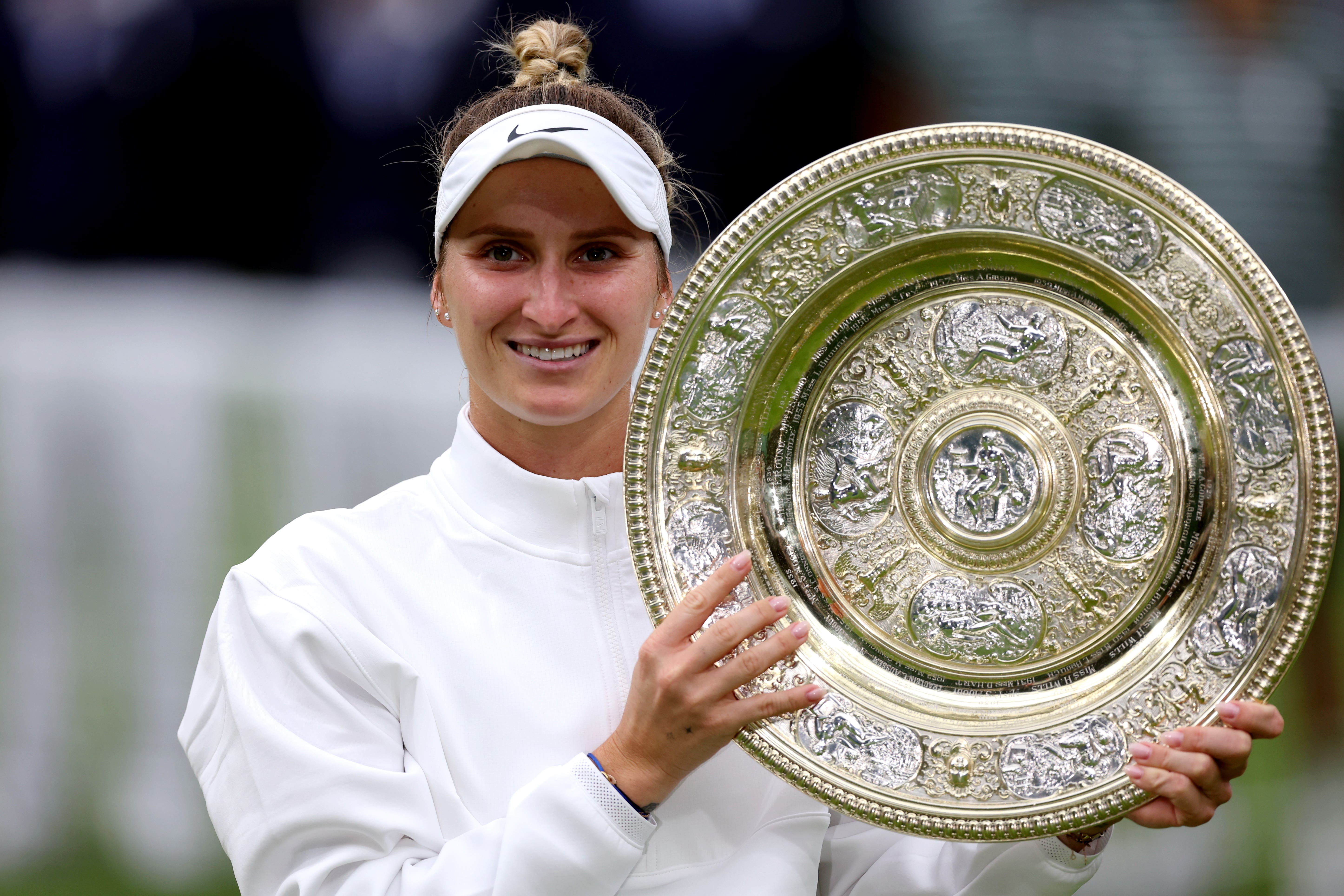 Marketa Vondrousova celebrates with the Venus Rosewater Dish (Steven Paston/PA)