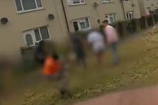 Footage shows moments before dog is tasered and put in wheelie bin by police