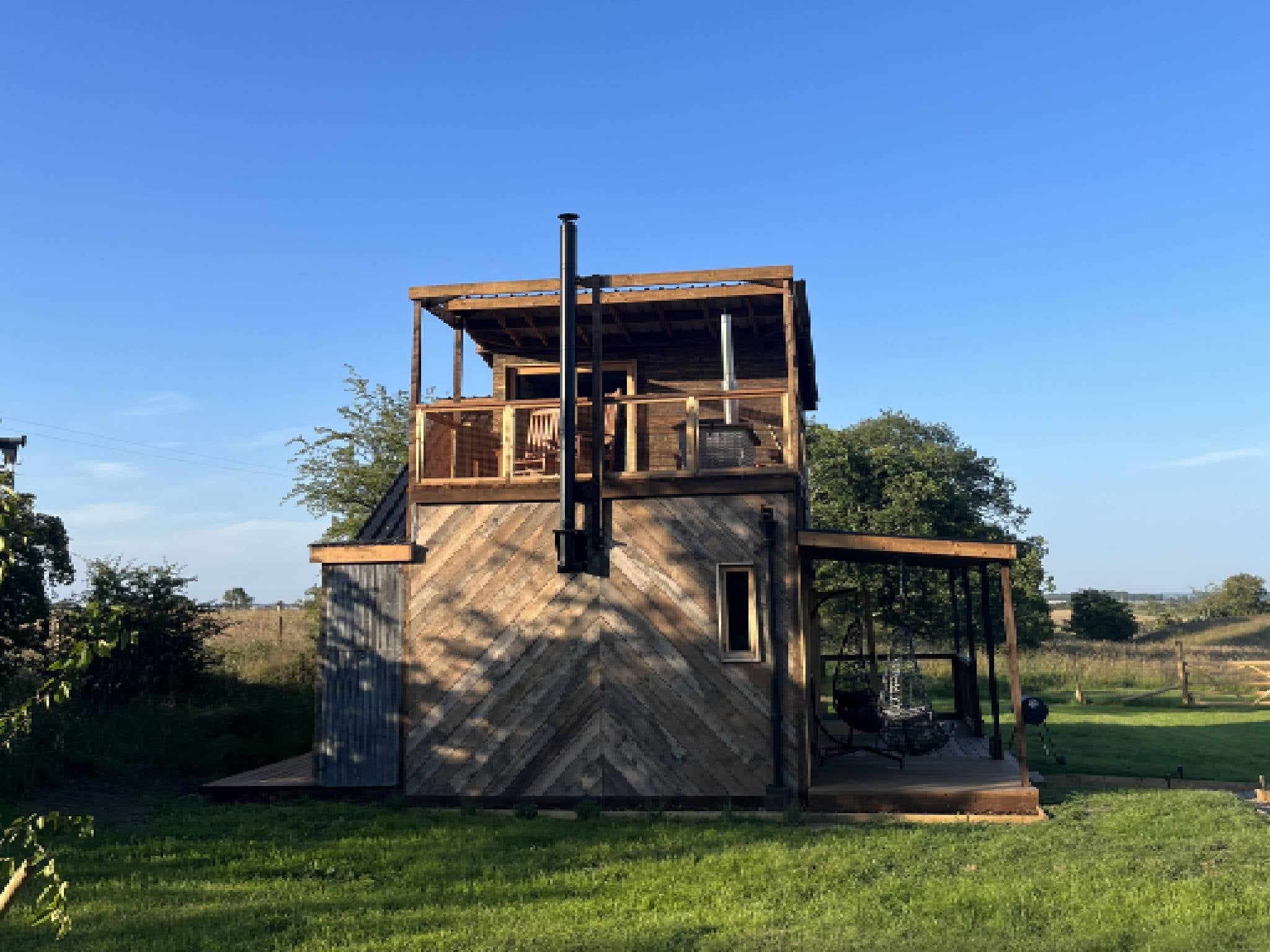 The luxurious hut is made from reclaimed timber and has upcycled oak flooring throughout