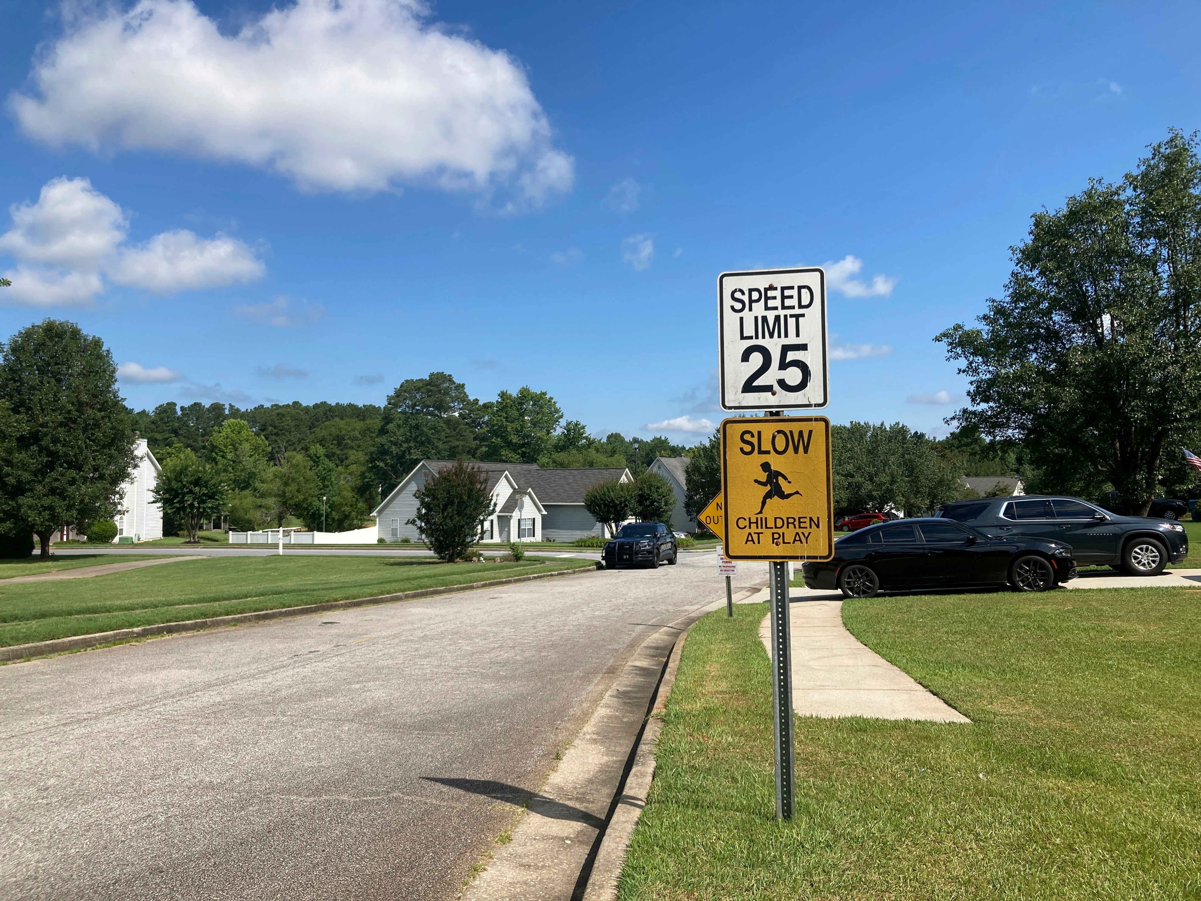 The entrance to the Dogwood Lakes neighborhood in Hampton, Ga., is shown on Sunday, July 16, 2023.