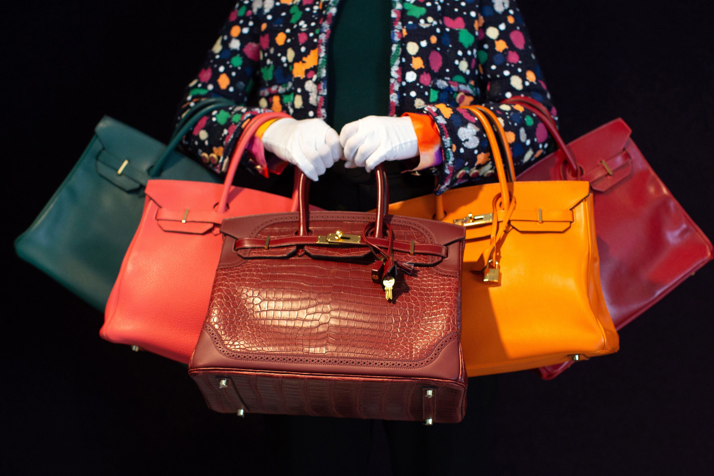 Rare Hermes Birkin bags can fetch six figures at auction (Alamy/PA)