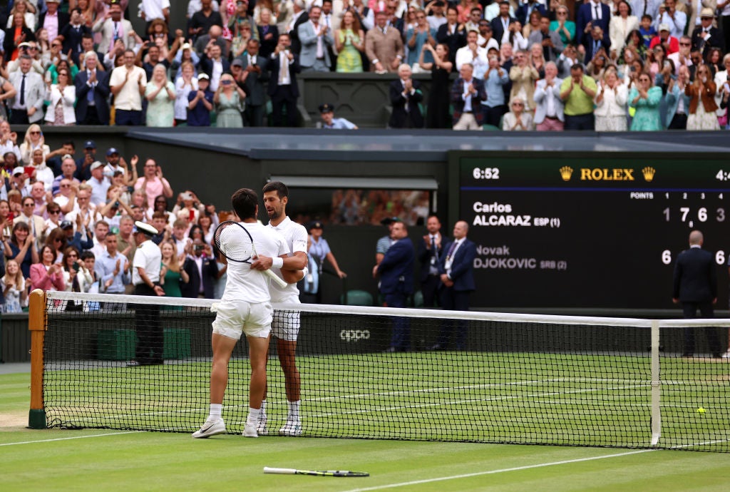 The pair embrace after their five-set thriller