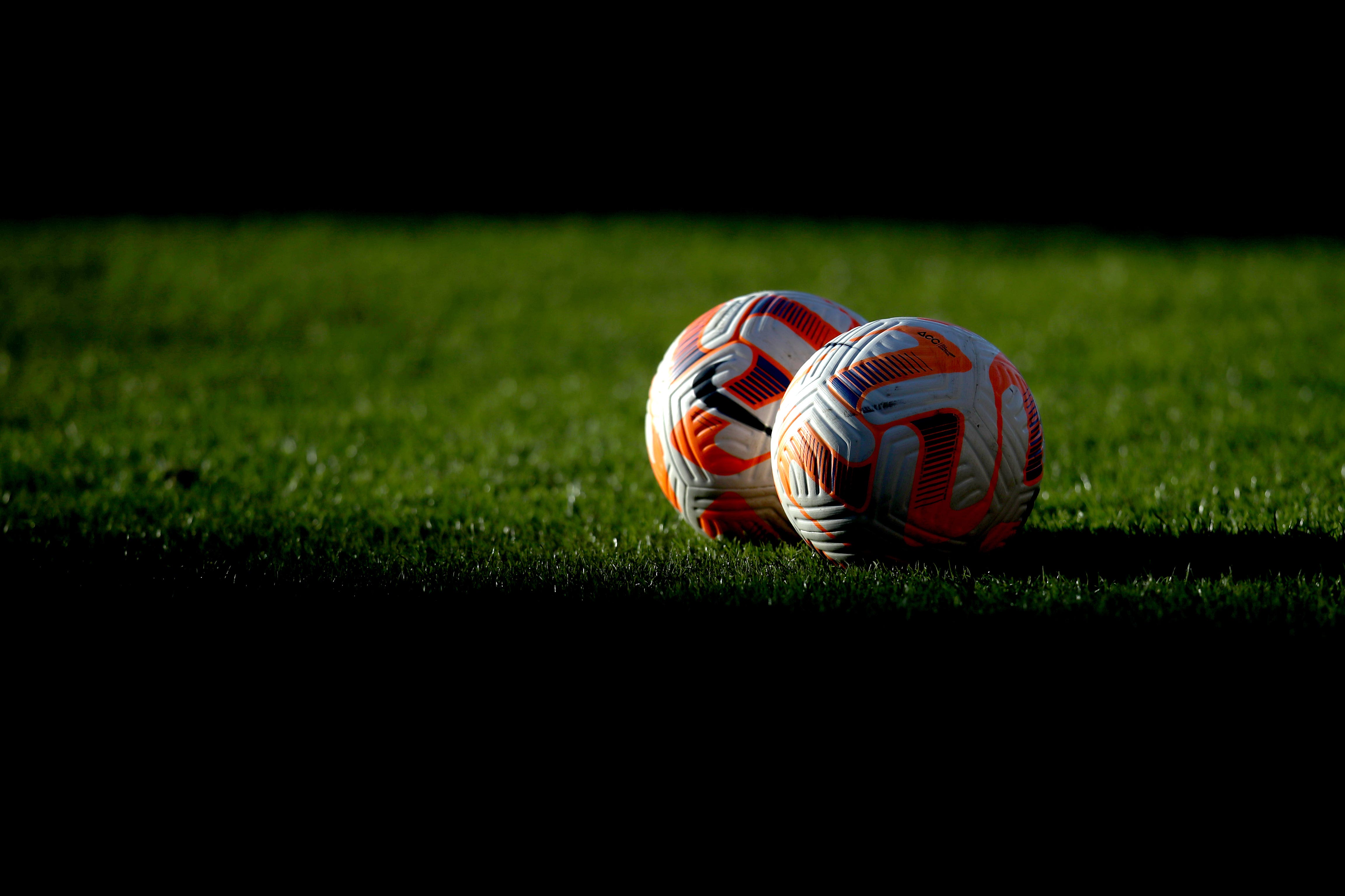 A general view of footballs on the pitch ahead of the Barclays Women’s Super League match at Leigh Sports Village, Manchester. Picture date: Wednesday April 19, 2023.