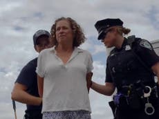 Disney heiress cut from pipe and arrested in climate protest over private jets in the Hamptons