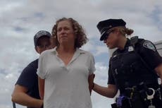 Disney heiress cut from pipe and arrested in climate protest over private jets in the Hamptons