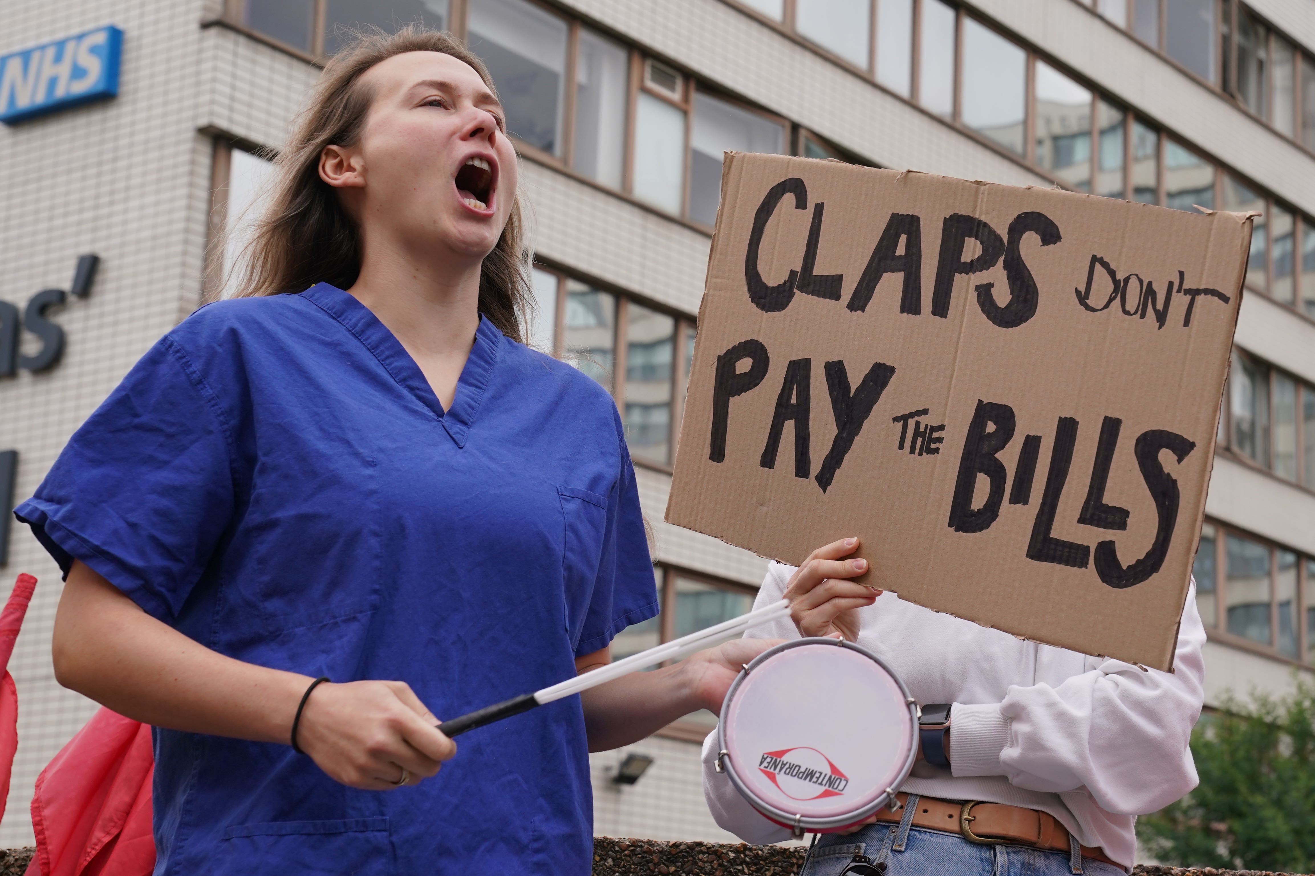 Members of the Unite union on the picket line outside Guys and St Thomas’s Hospital in London during a 24-hour strike in their continued dispute over pay (PA)