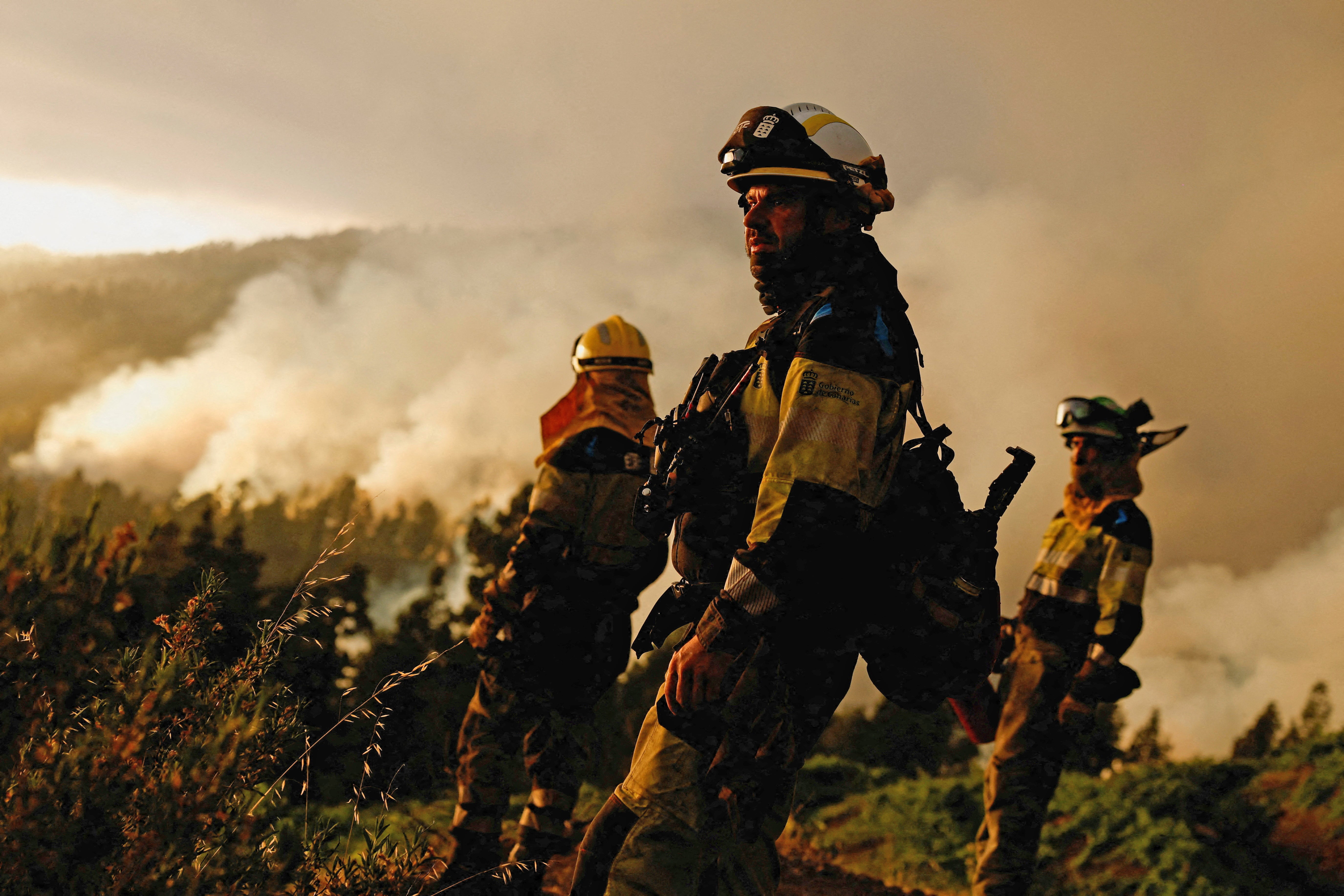 EIRIF forest firefighters work during the extinction of the Tijarafe fire on the Canary Island of La Palma, Spain July 16, 2023