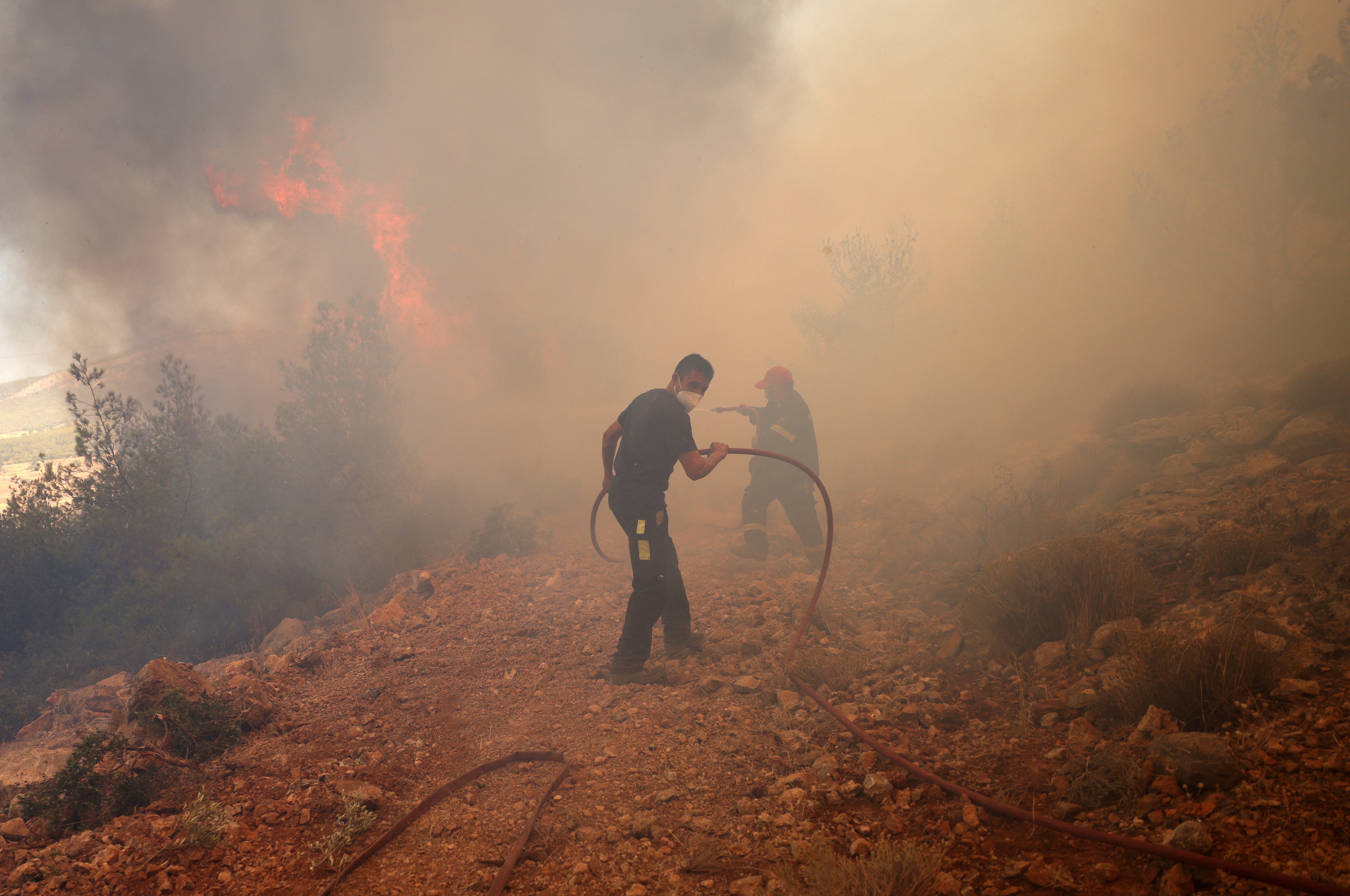 Wildfire burning near the village of Kandyli, near Athens