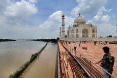 Yamuna river reaches the iconic Taj Mahal's outer walls in India after swelling with monsoon rains