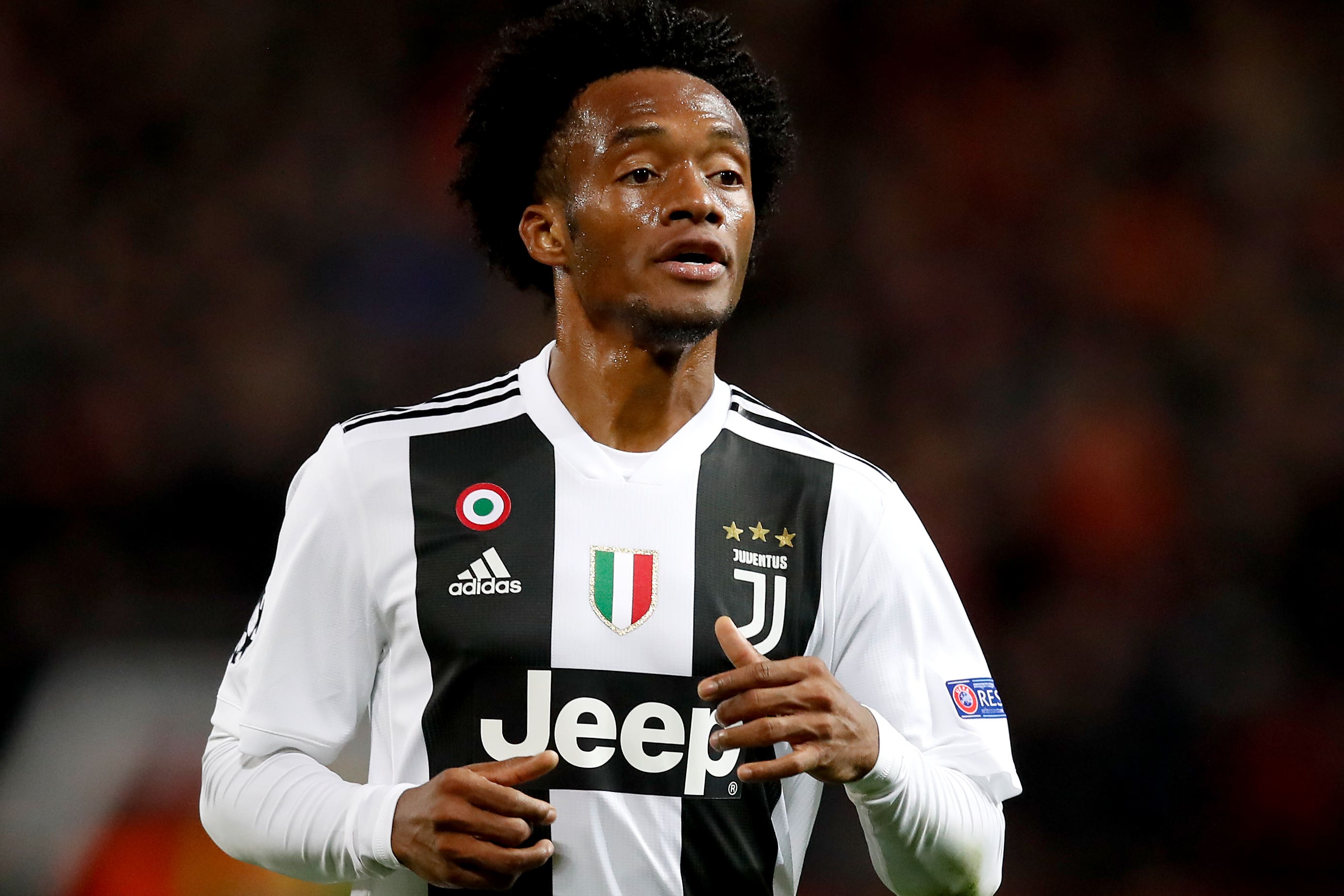 Juan Cuadrado has stayed in Italy (Martin Rickett/PA)