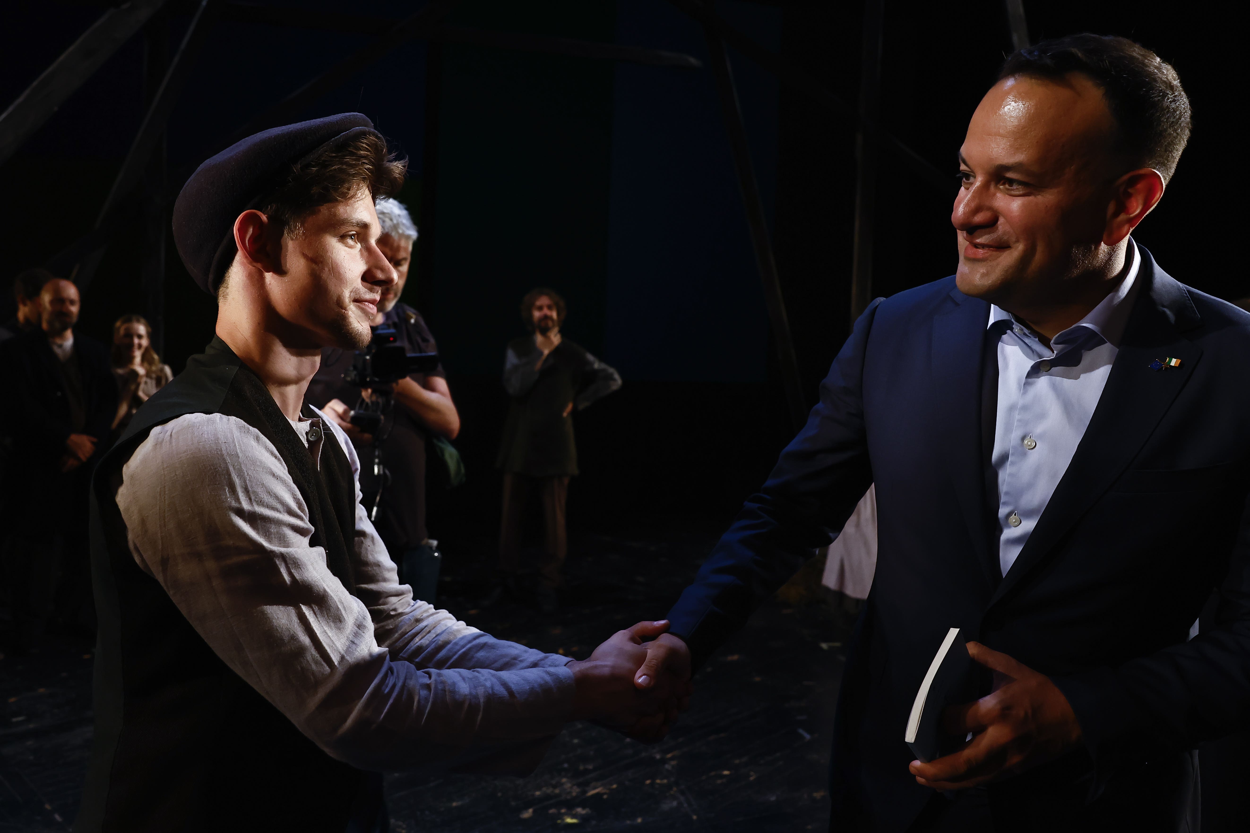 Taoiseach Leo Varadkar (right) shakes hands with actor Oleksandr Hrekov, during a visit to Lesya Ukrainka Theatre following a meeting with Ukraine’s President Volodymyr Zelensky, in Kyiv, Ukraine (Clodagh Kilcoyne/PA)