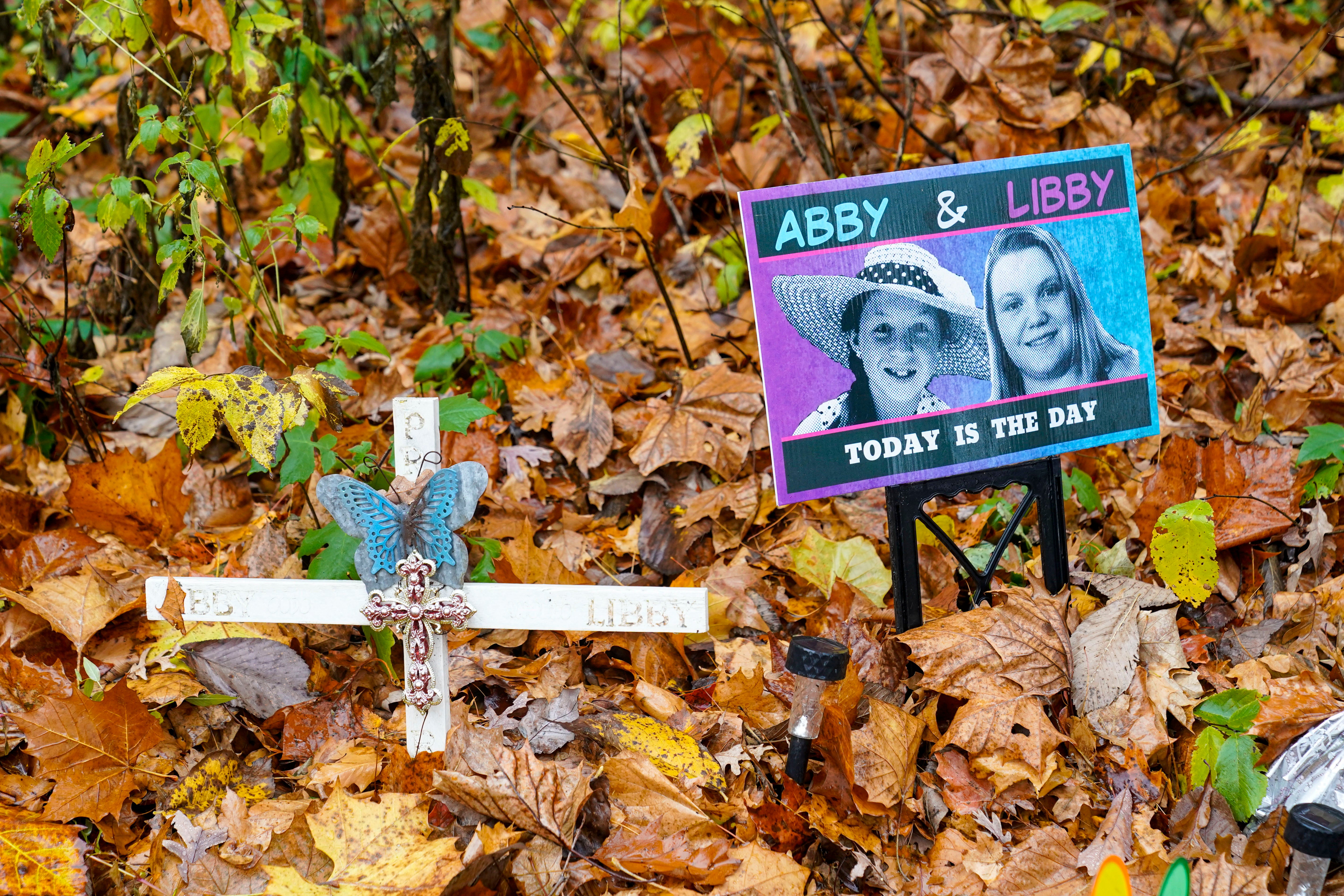 A makeshift vigil at the scene of the murders