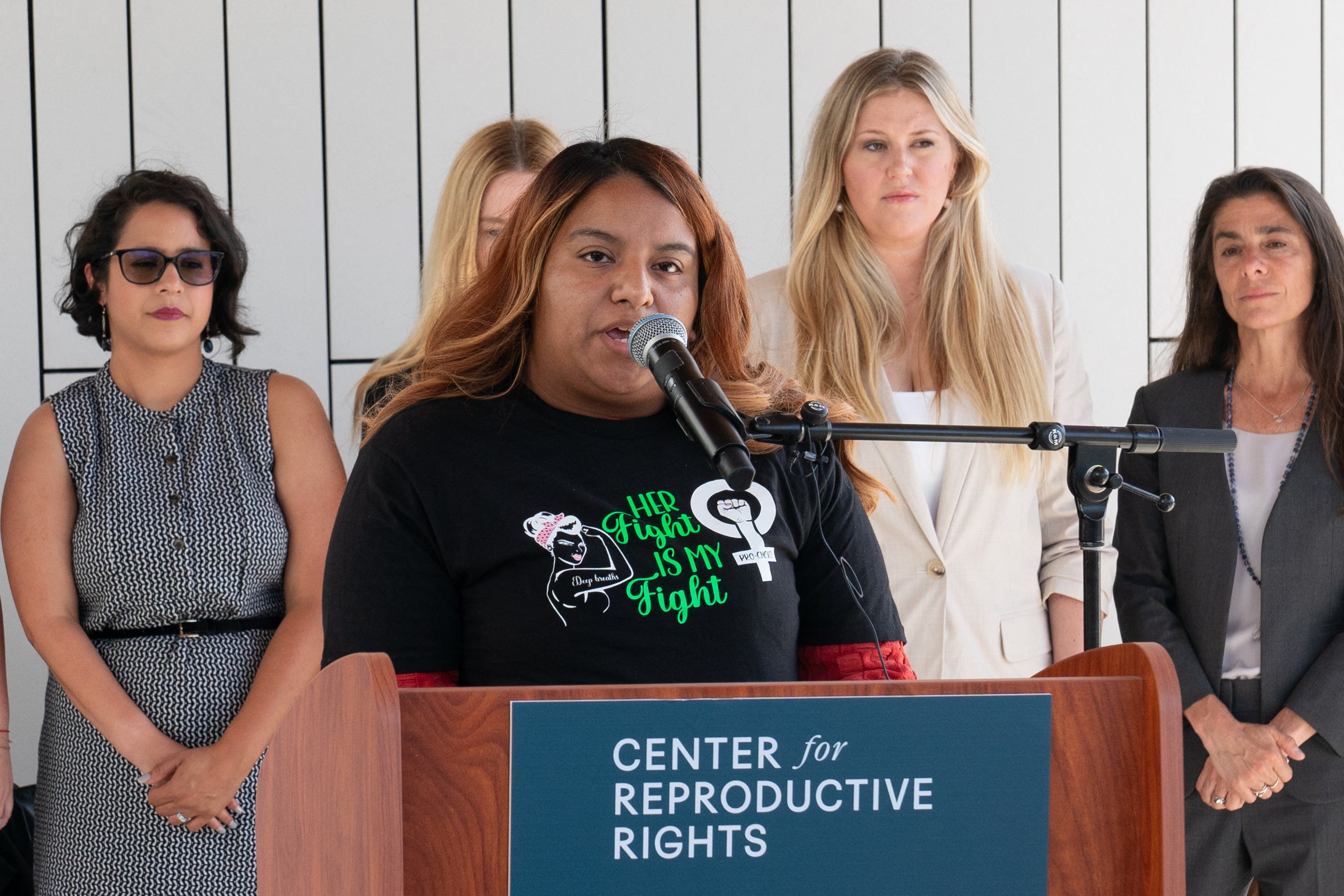 Samantha Casiano speaks during a press conference outside the Travis County Courthouse in Austin, Texas on 19 July.