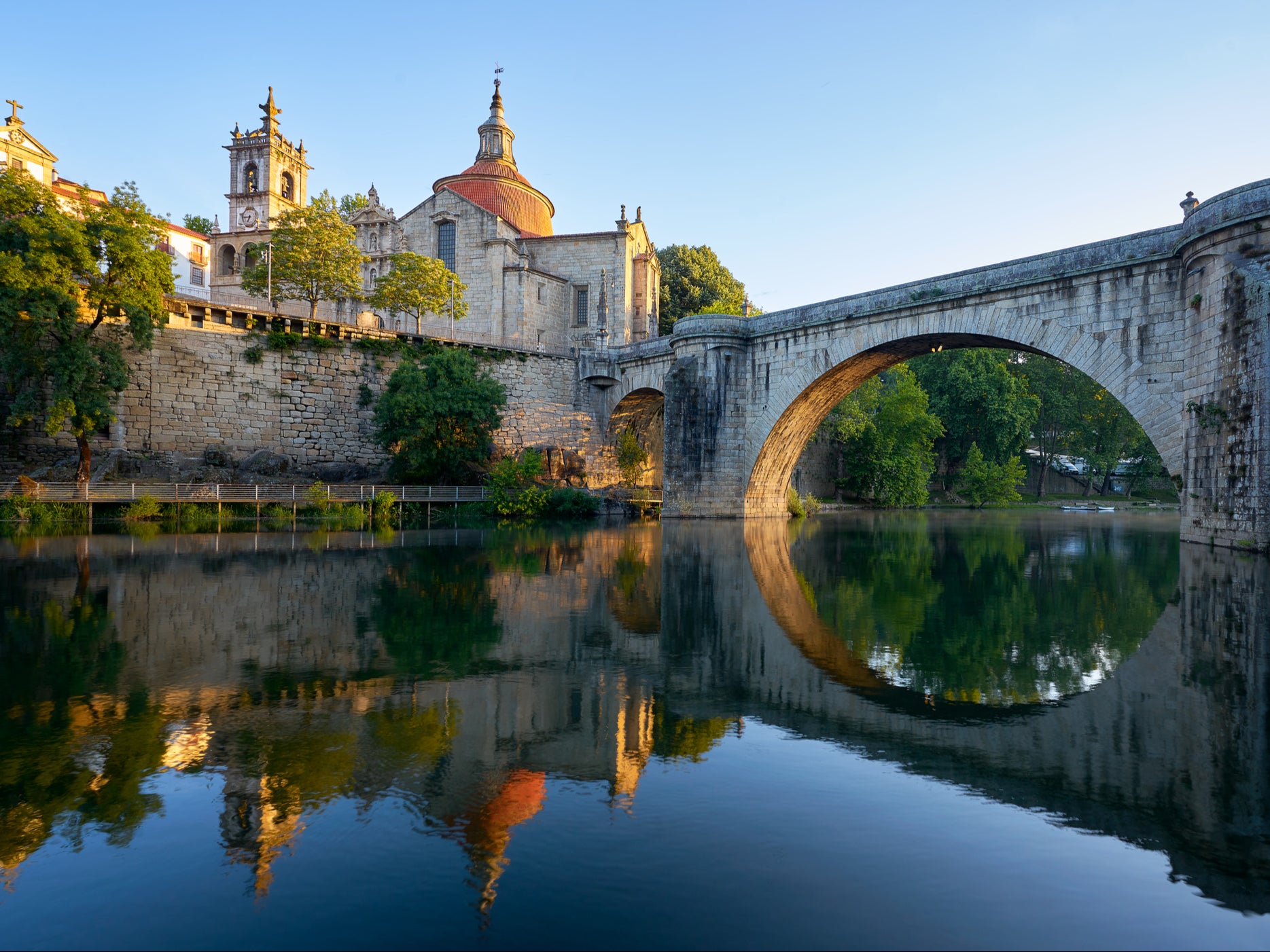 Renaissance and medieval buildings look out onto the Tamega River