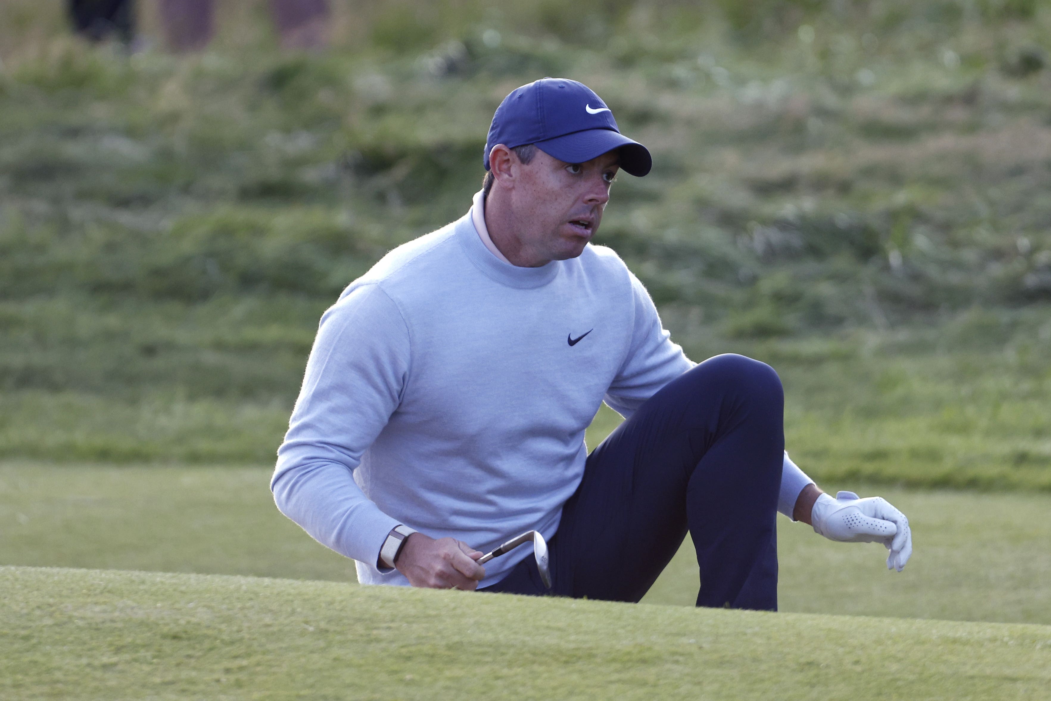 Rory McIlroy climbs out of the bunker on the 18th during day one of The Open at Royal Liverpool (Richard Sellers/PA)