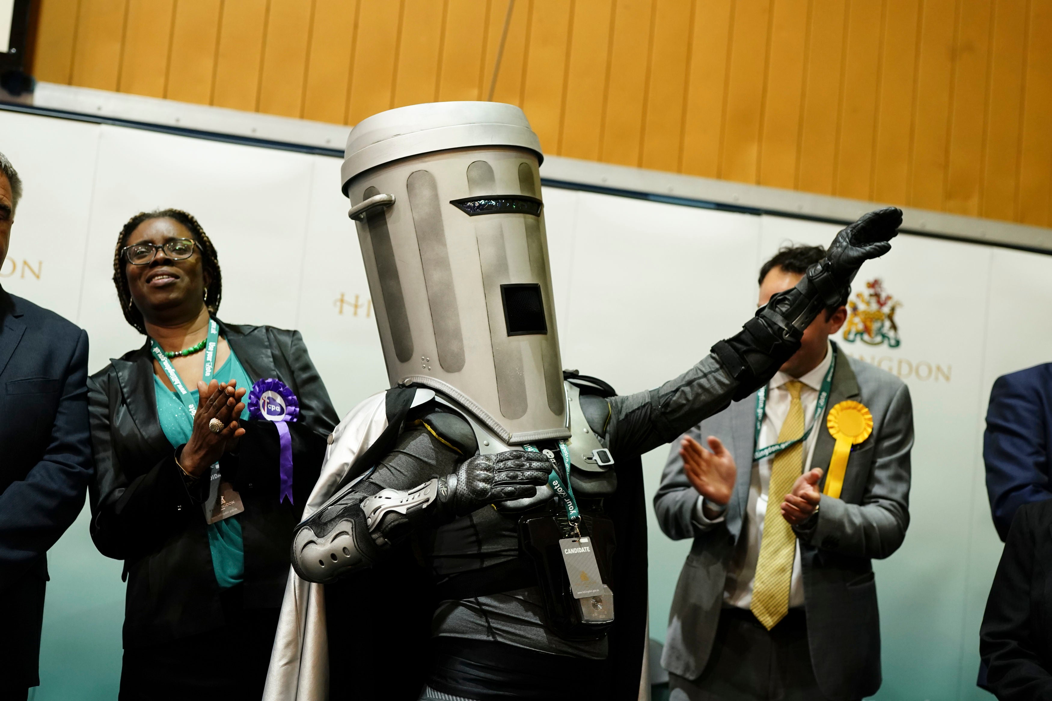 Count Binface celebrates on stage as the results are read in the Uxbridge and South Ruislip by-election