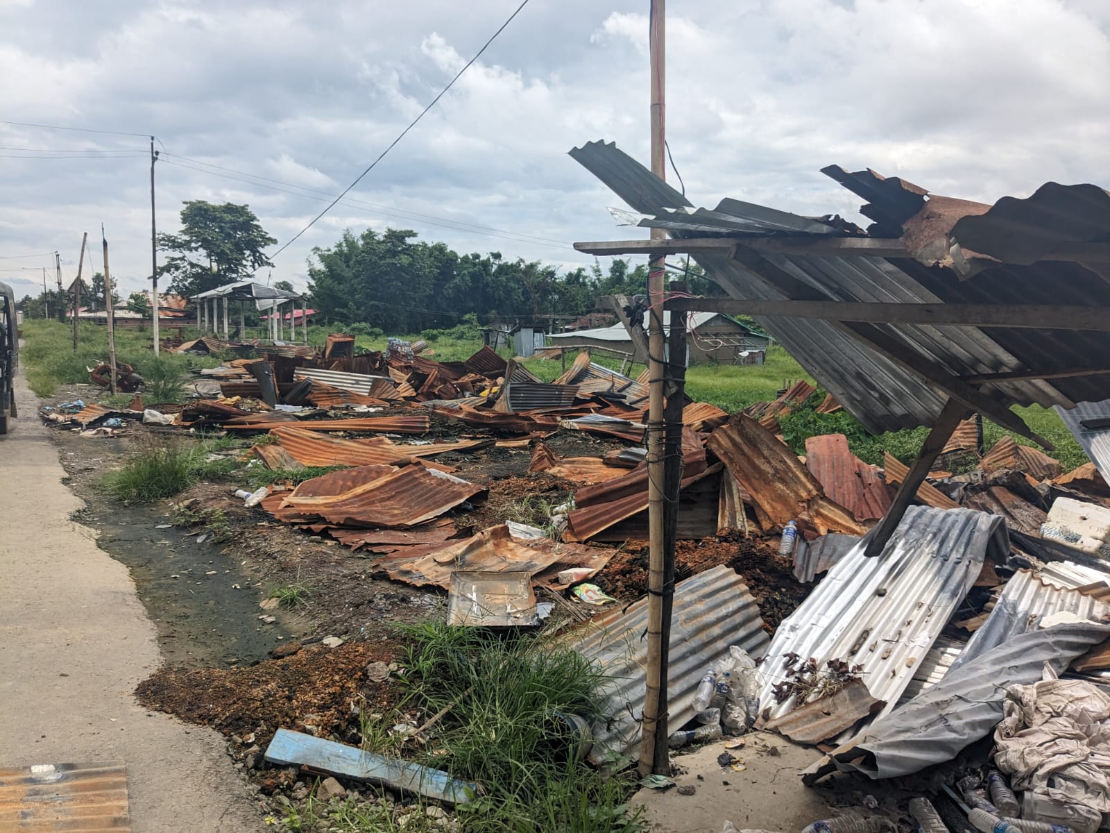 Burnt remains of homes on way to Churachandpur via Bishnupur in Manipur on 17 July 2023