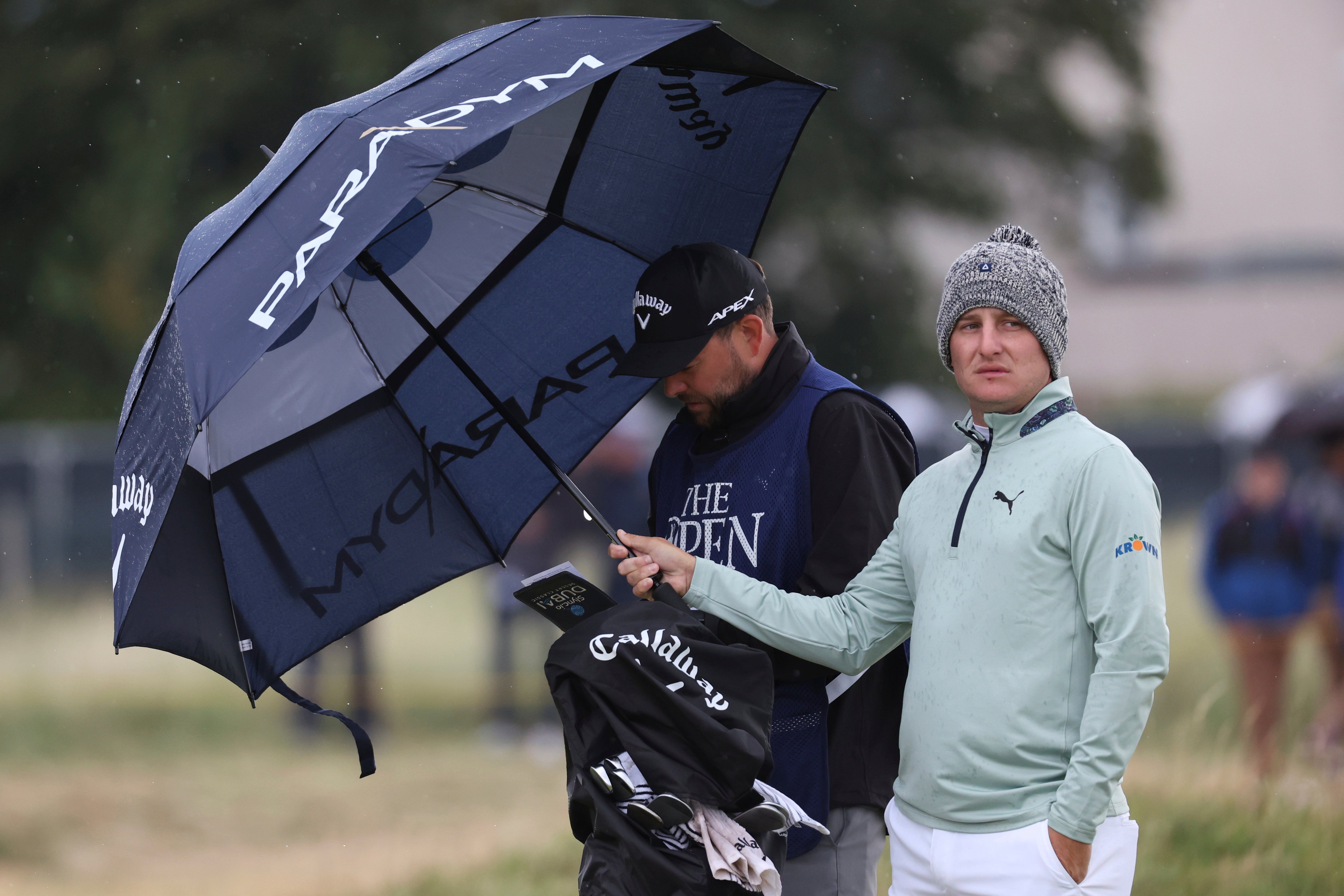 Rain is affecting Open Championship golf tournament in Liverpool and Ashes test cricket in Manchester