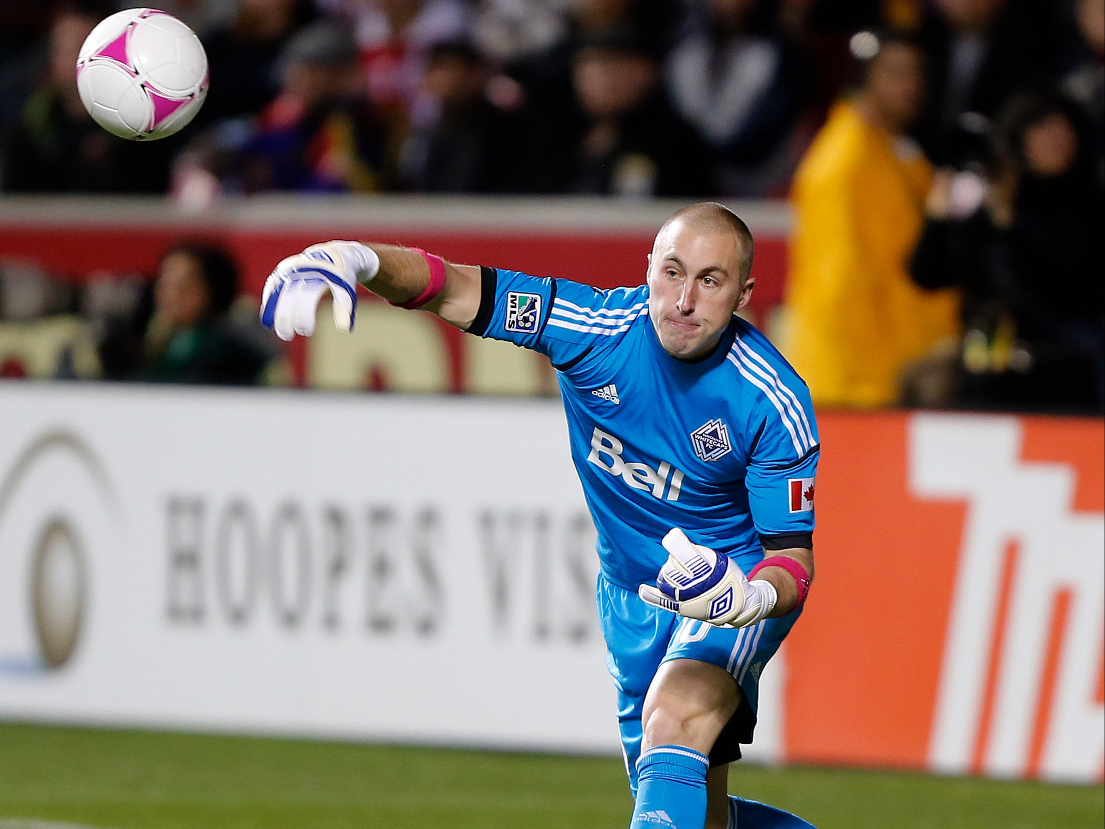 Goalie Brad Knighton #18 of Vancouver Whitecaps throws the ball down field during a game against Real Salt Lake during the first half of an MLS soccer game October 27, 2012 at Rio Tinto Stadium in Sandy, Utah