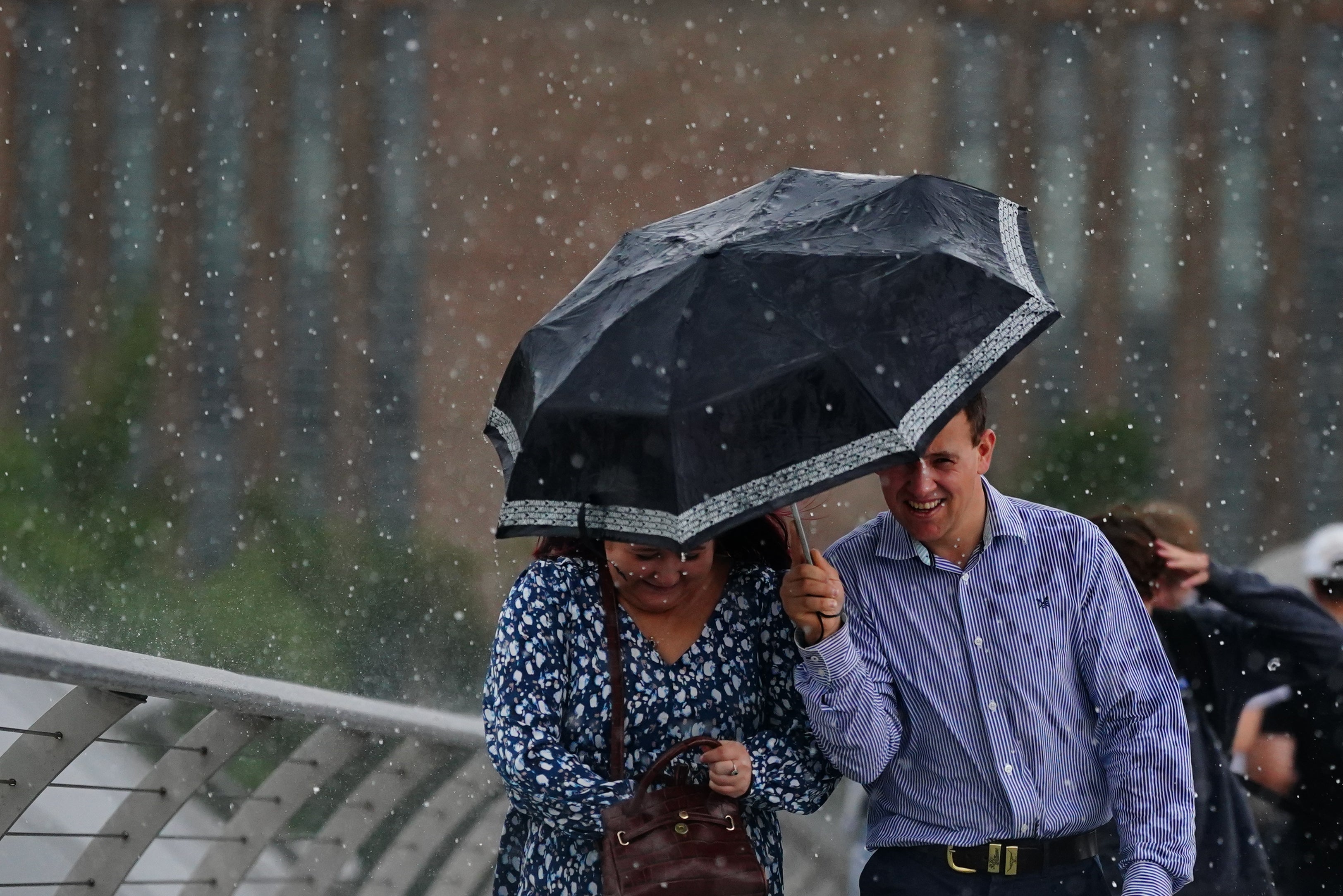Rainy weather batters UK as millions take to the roads for start of summer holidays