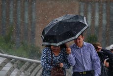 Rainy weather batters UK as millions take to the roads for start of summer holidays