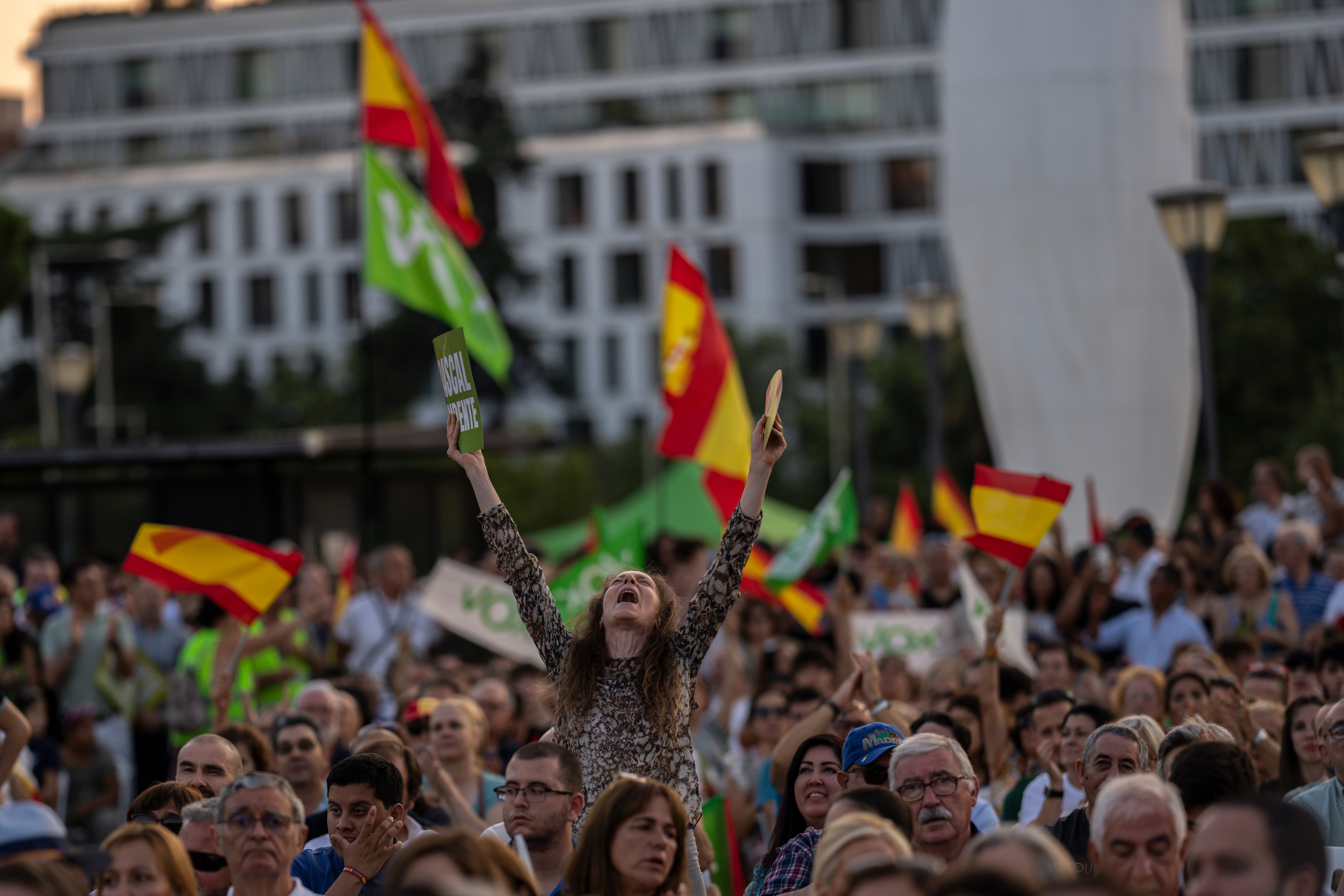 VOX far right supporters wave during a rally in Madrid on 21 July, 2023