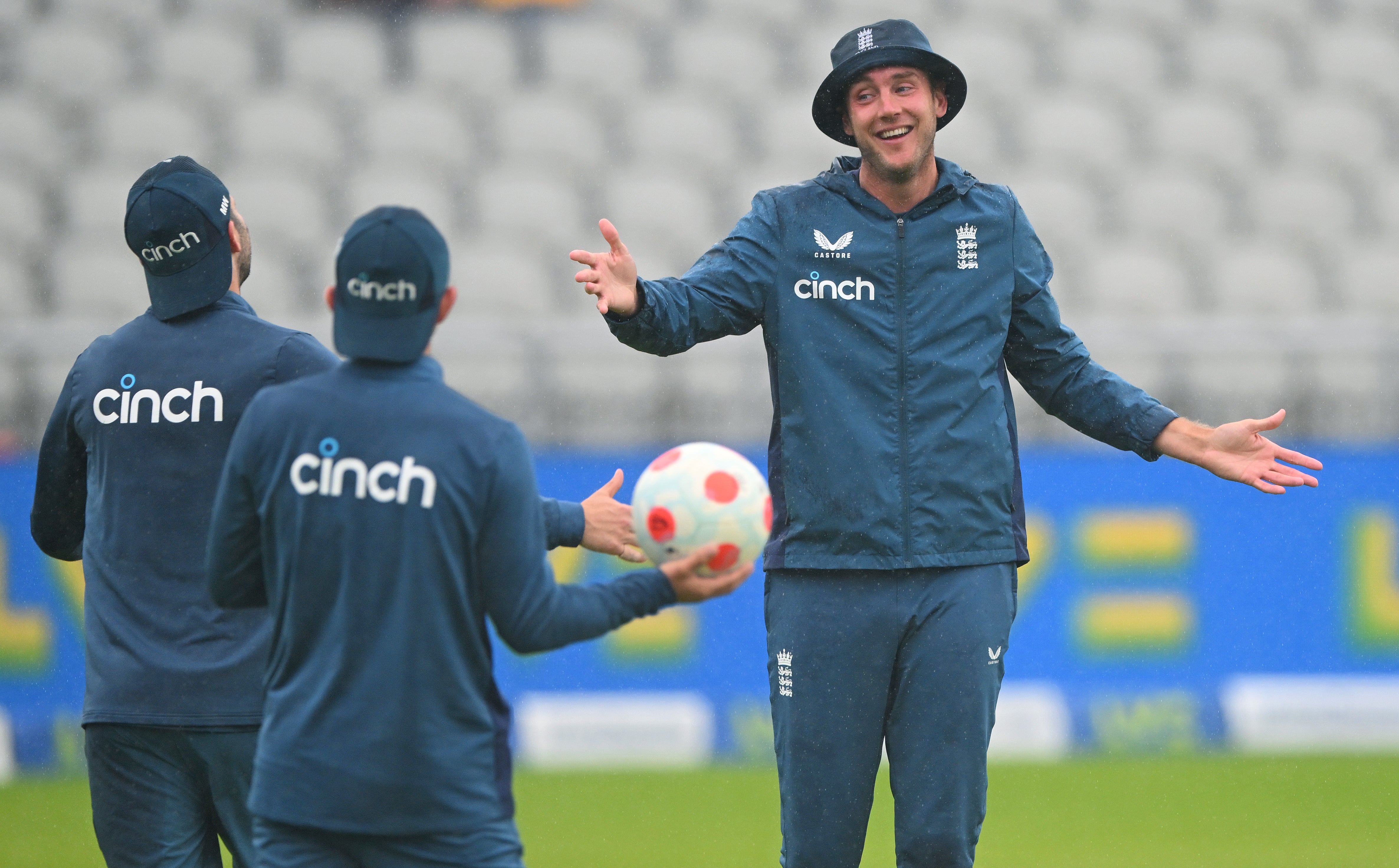 England tried to keep spirits up even as the rain fell in Manchester